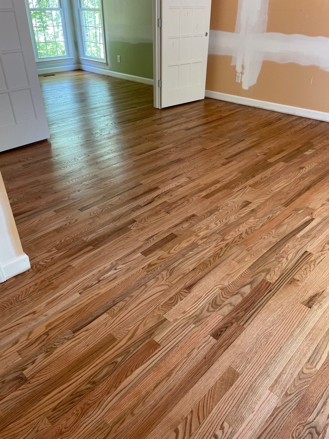 Red oak floor refinishing by Accent Custom Floors