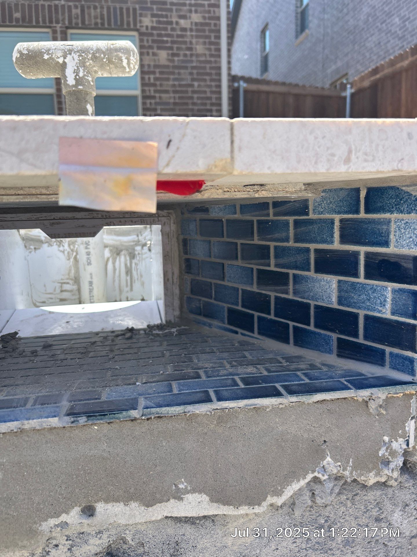 Sleek Geometric Pool with Tanning Ledge and Turf by Pinnacle Pools and Spas - DFW