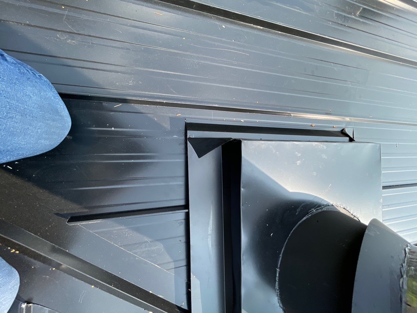 Residential ReRoofing Installation using 12" Prolok metal by Top Notch Roofing Inc