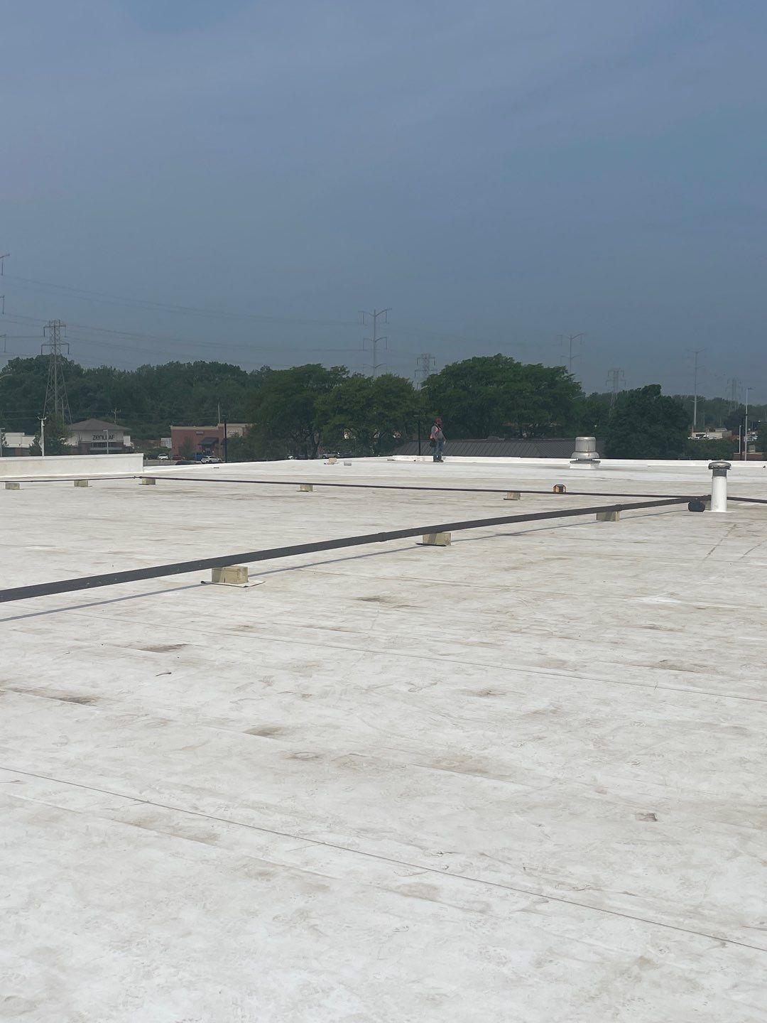 Ford Dealership - Re-Roof by Pink Roofing