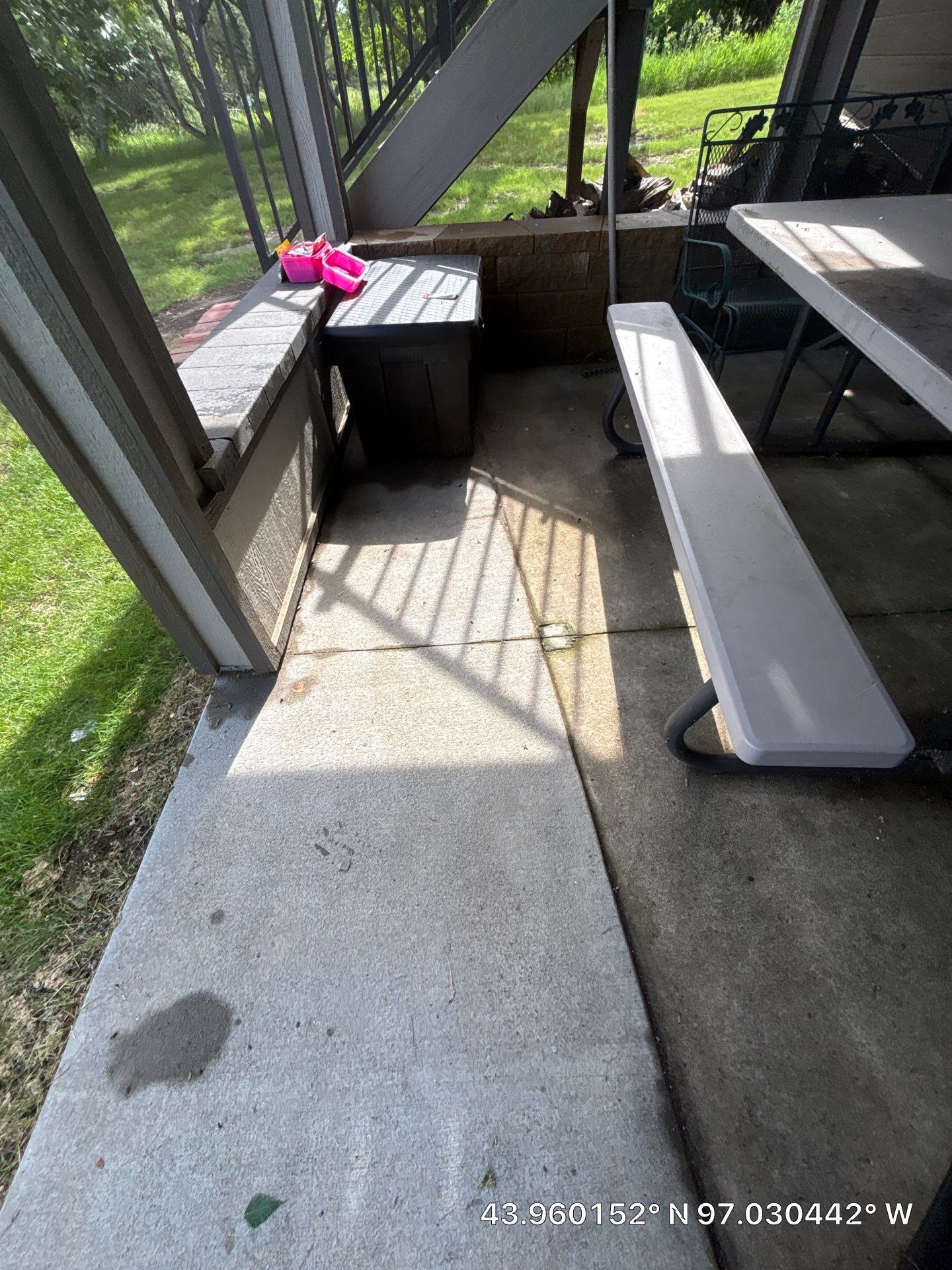 Lakefront Screened Patio Concrete Coating Installation in Wentworth by Select Painting, Coatings & Garage Cabinets