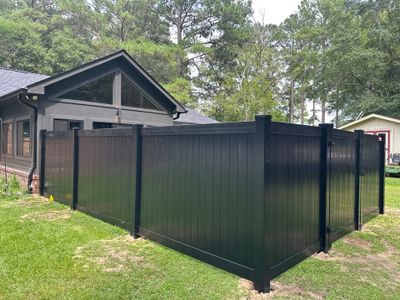 Black Vinyl Privacy Fence with Puppy Picket Aluminum Installation in Roseboro