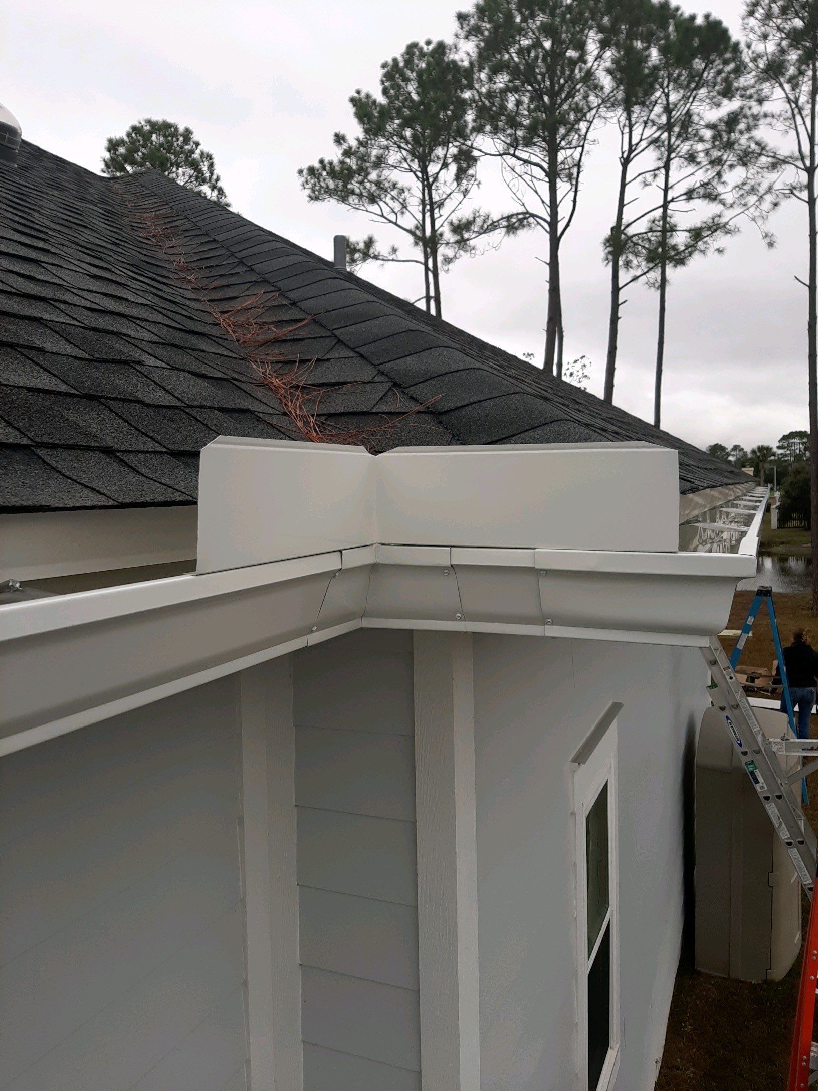 Gutter Installation using White K-Style Seamless Gutters by Gutter Professors