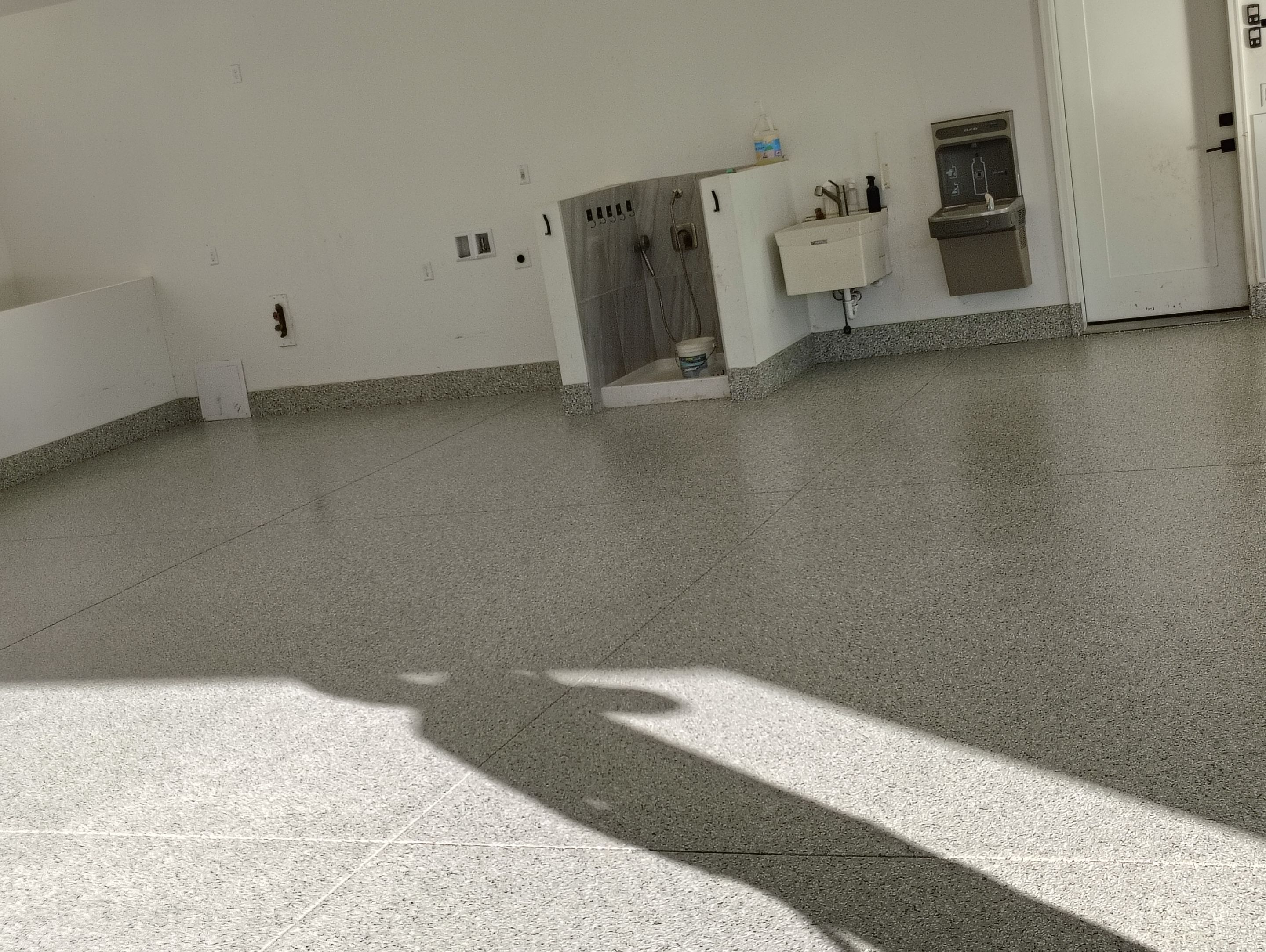Epoxy Flake Garage Floor and Stair Coating in Sioux Falls by Select Painting, Coatings & Garage Cabinets
