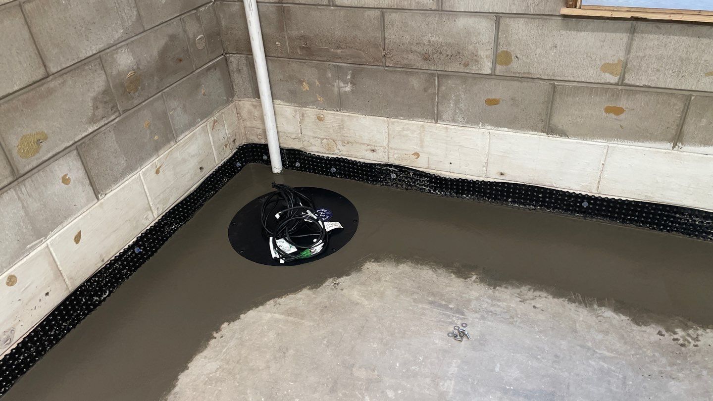 Interior Drain Tile & Sump System in St. Paul, MN by Waterproofing Northeast