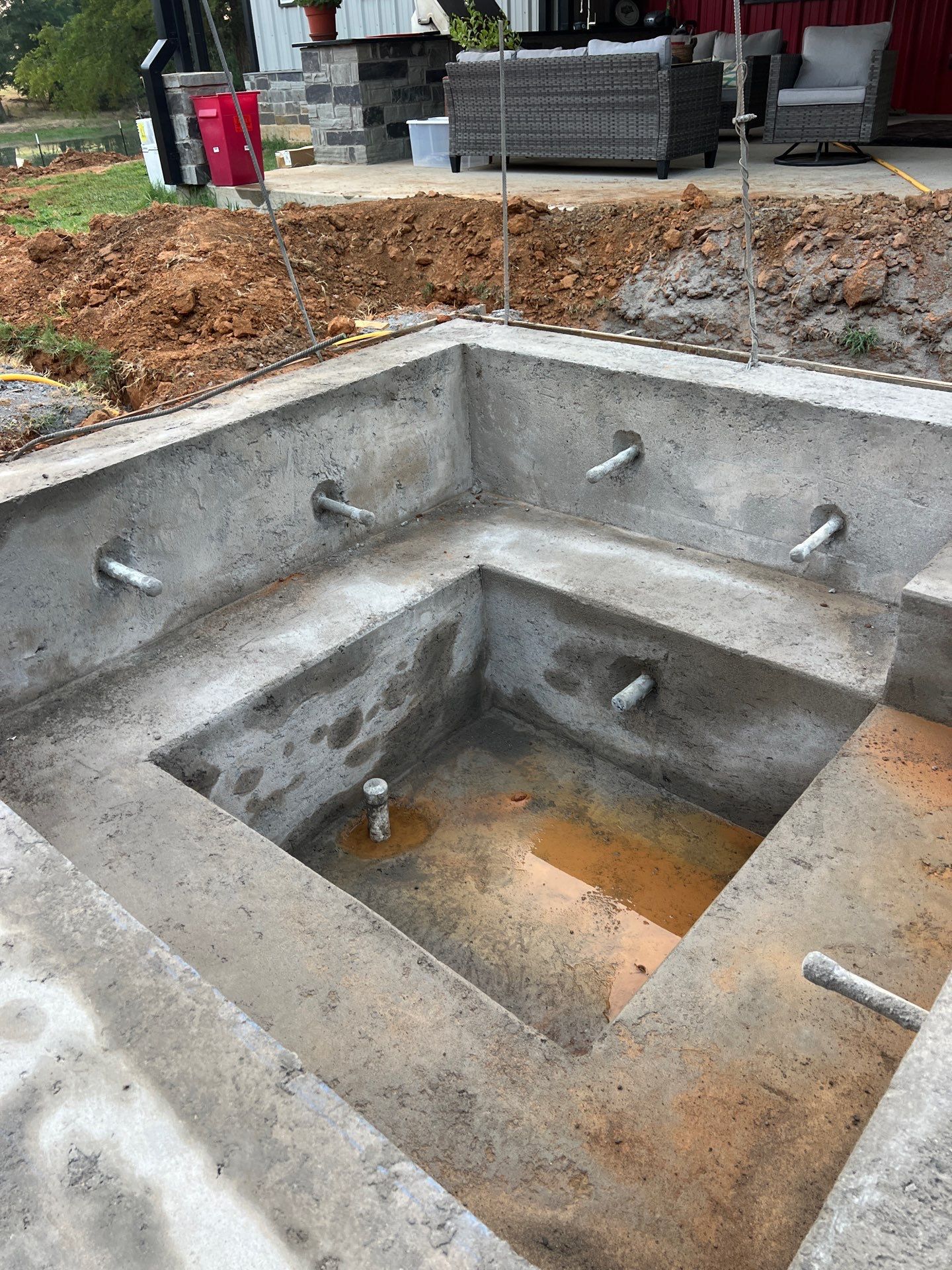 Sleek Rectangular Pool with Dark Interior Finish by Pinnacle Pools and Spas - DFW