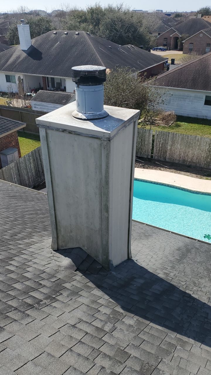 Residential Roofing Repair Replacing Chimney Cap by Lighthouse Roofing