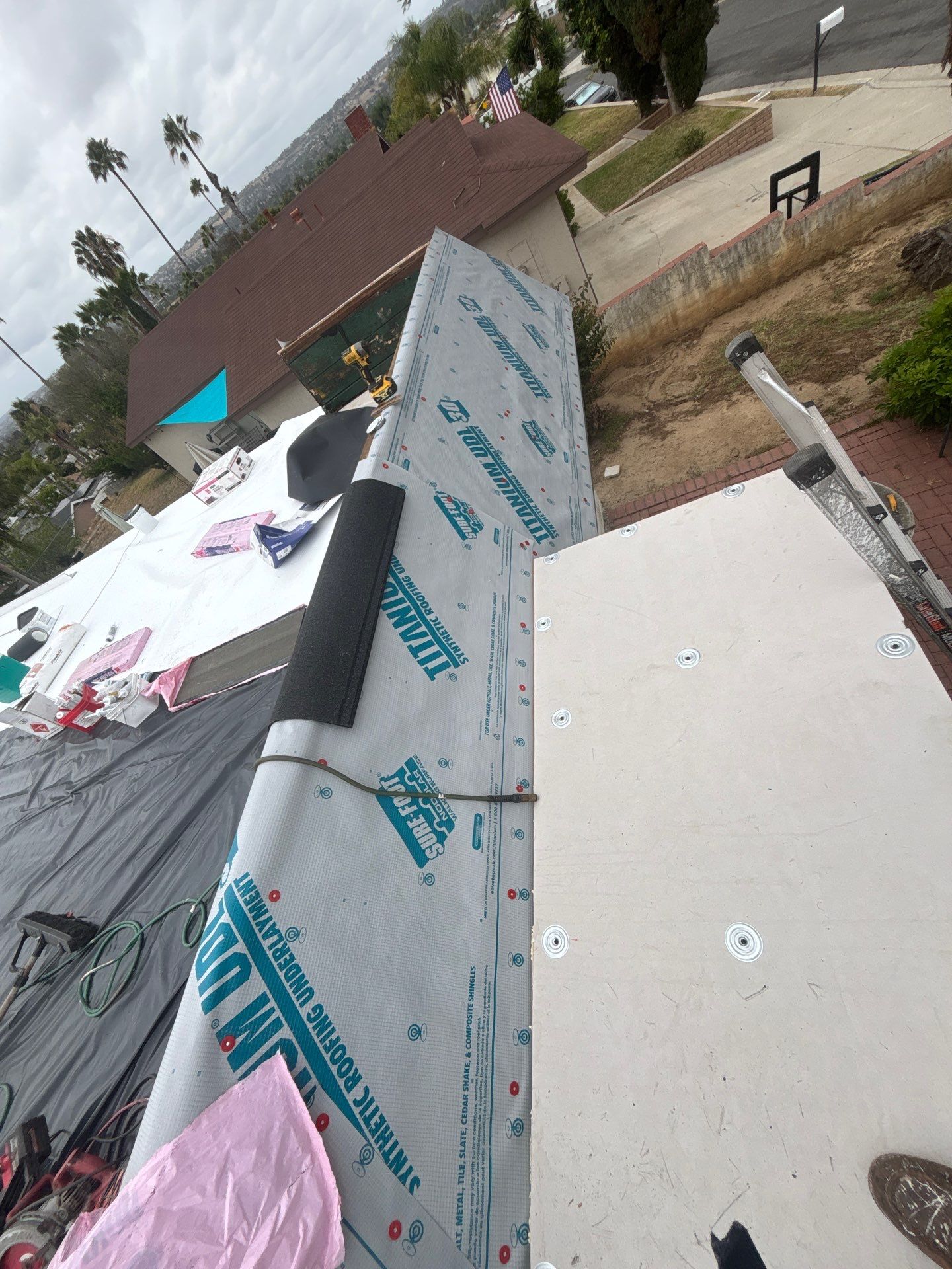 Oceanside Mansard TPO & Shingle Roof Replacement by Zenith Roofing Services