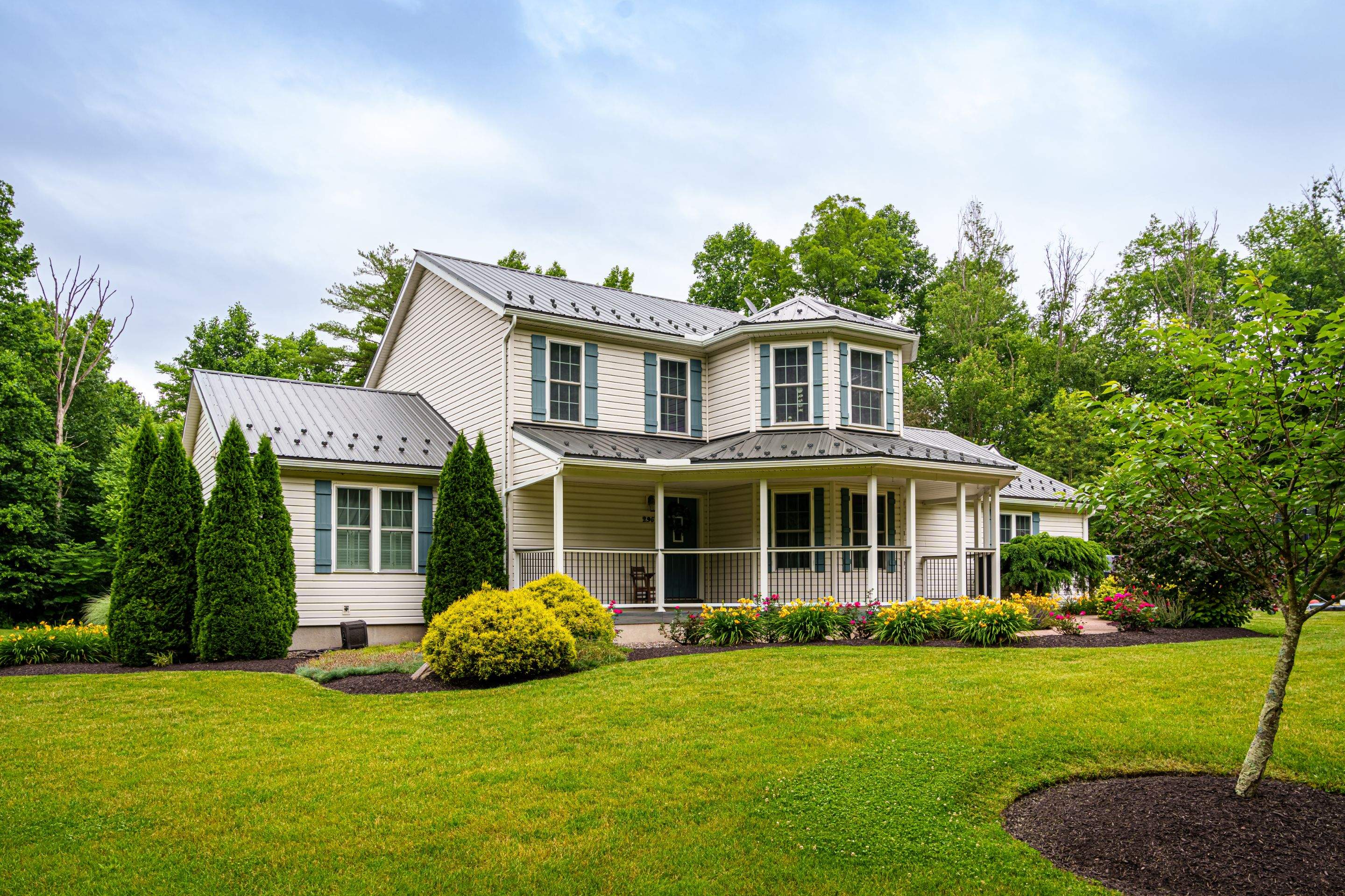 Metal roof install- shadow gray by Esh Builders