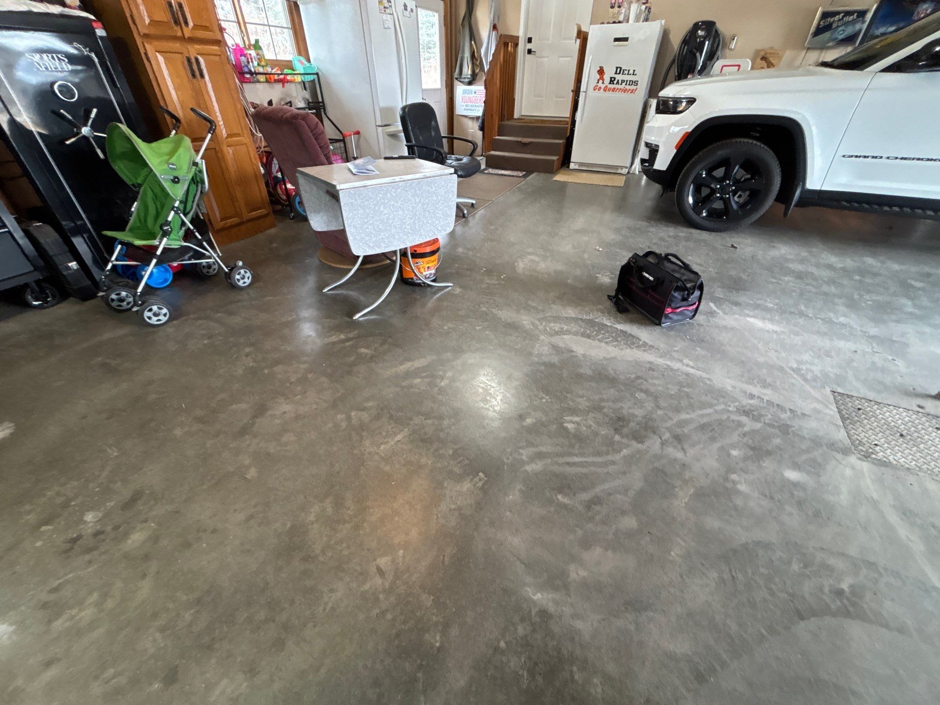 Multi-Fleck Epoxy Garage Floor Coating in Dell Rapids by Select Painting, Coatings & Garage Cabinets