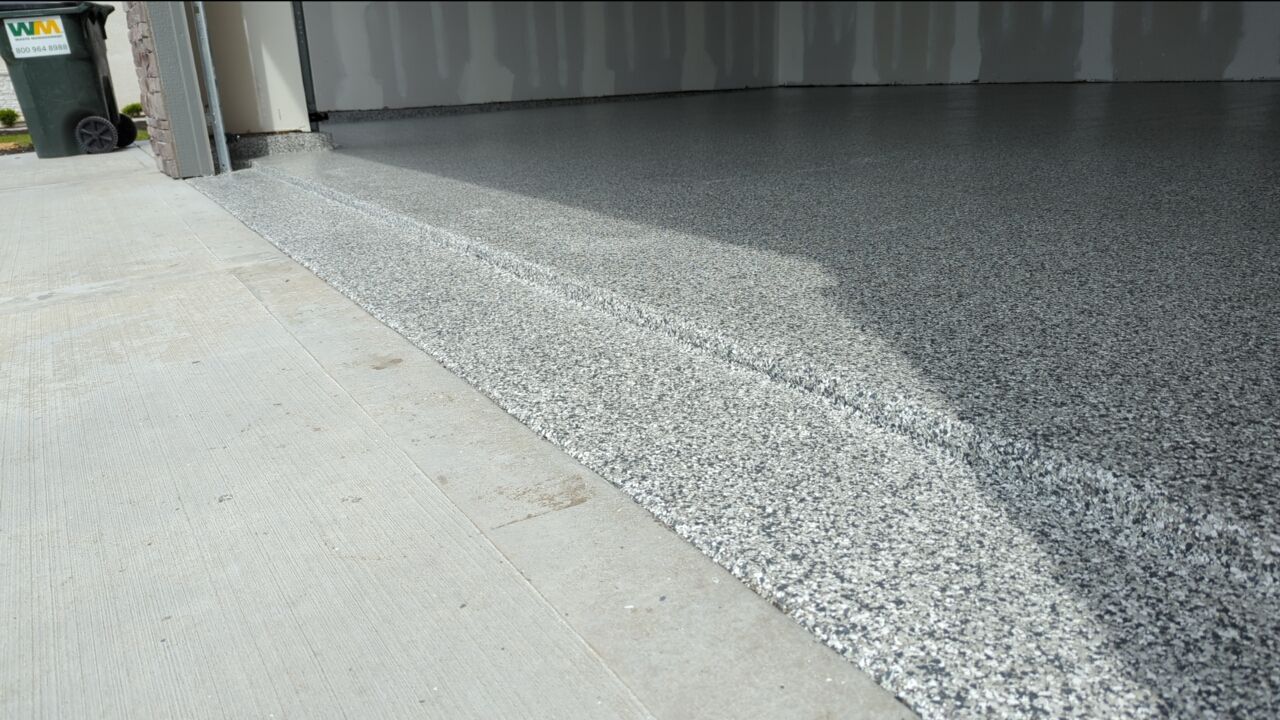 Garage using Slate Stone by Select Painting, Coatings & Garage Cabinets