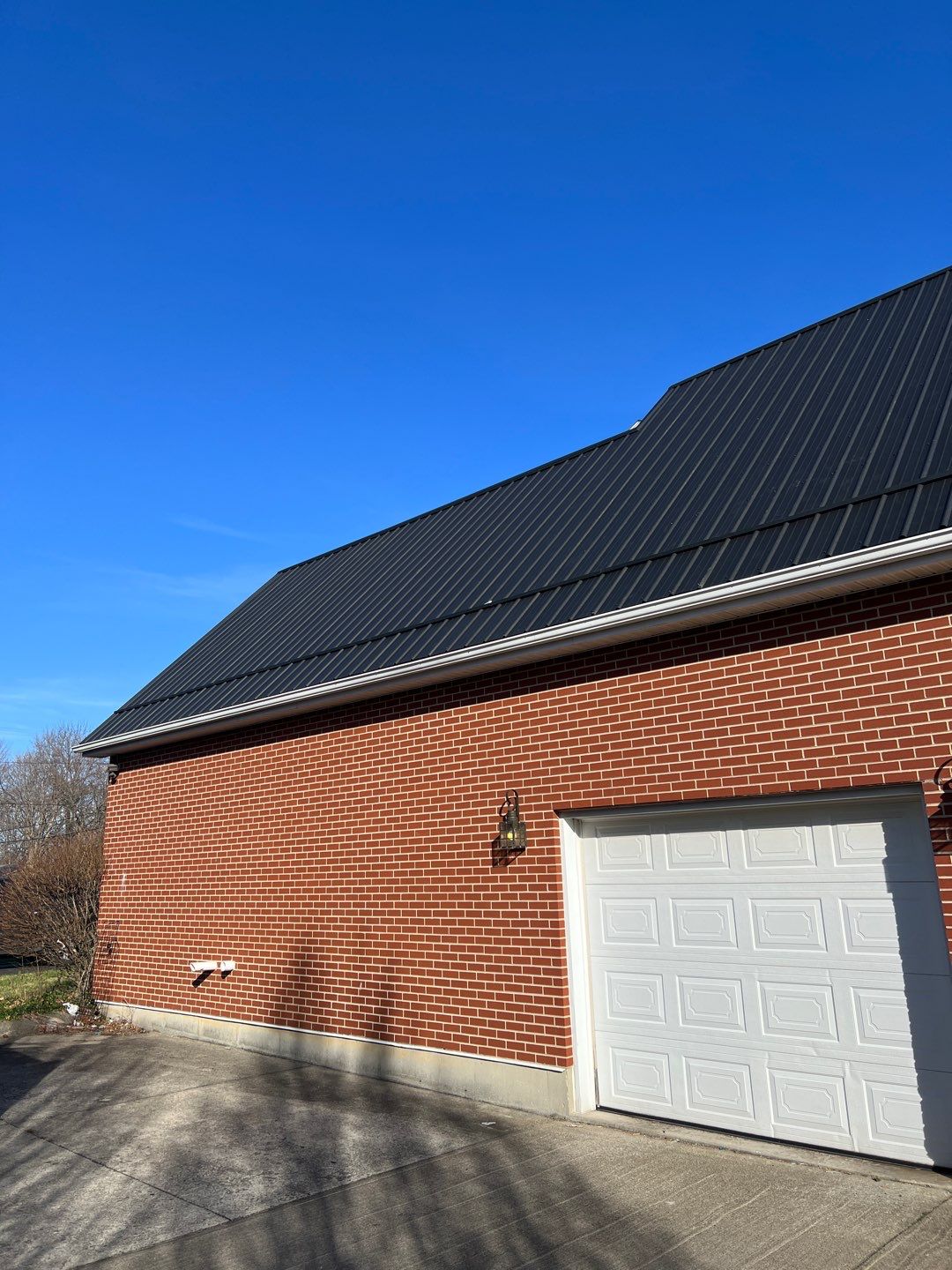 Residential Roofing Installation using Performance Panel Metal - Frost Black by RoofX 