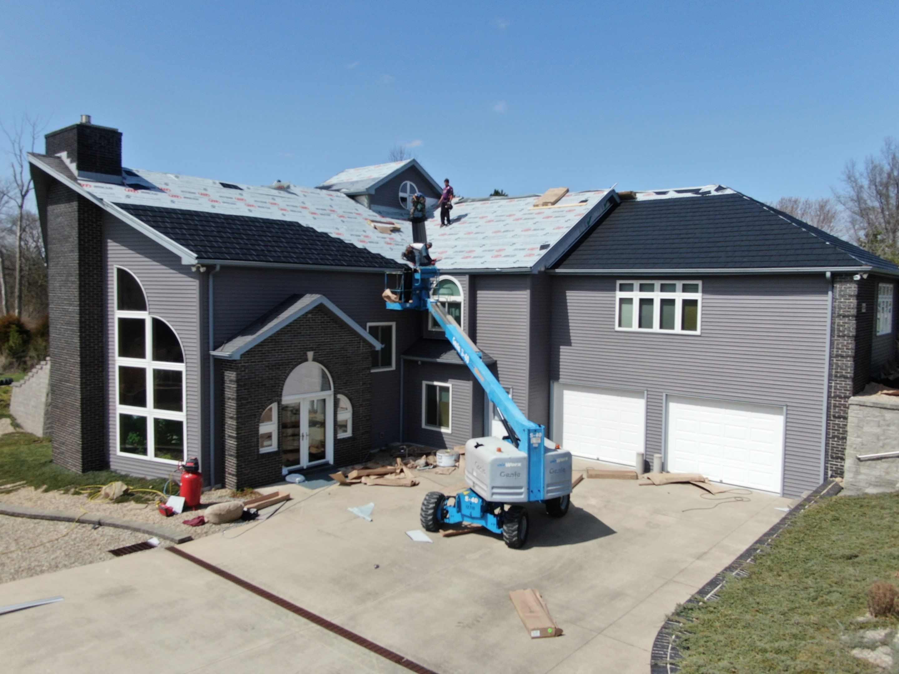Residential Roofing Installation using Vic West Nothridge Slate by 4Ever Metal Roofing