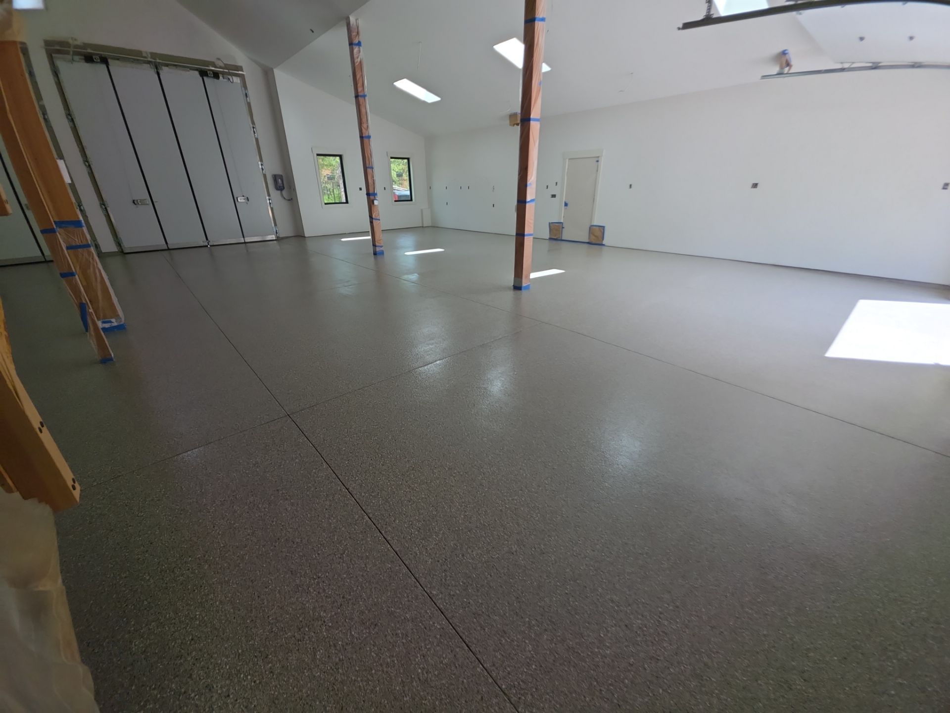 Claystone Hybrid Concrete Floor Coating for Newport Shop Transformation by Croc Coatings, LLC
