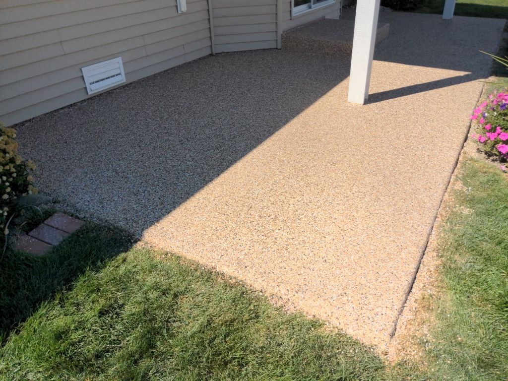 Patio Transformation using Sandstone by Croc Coatings, LLC