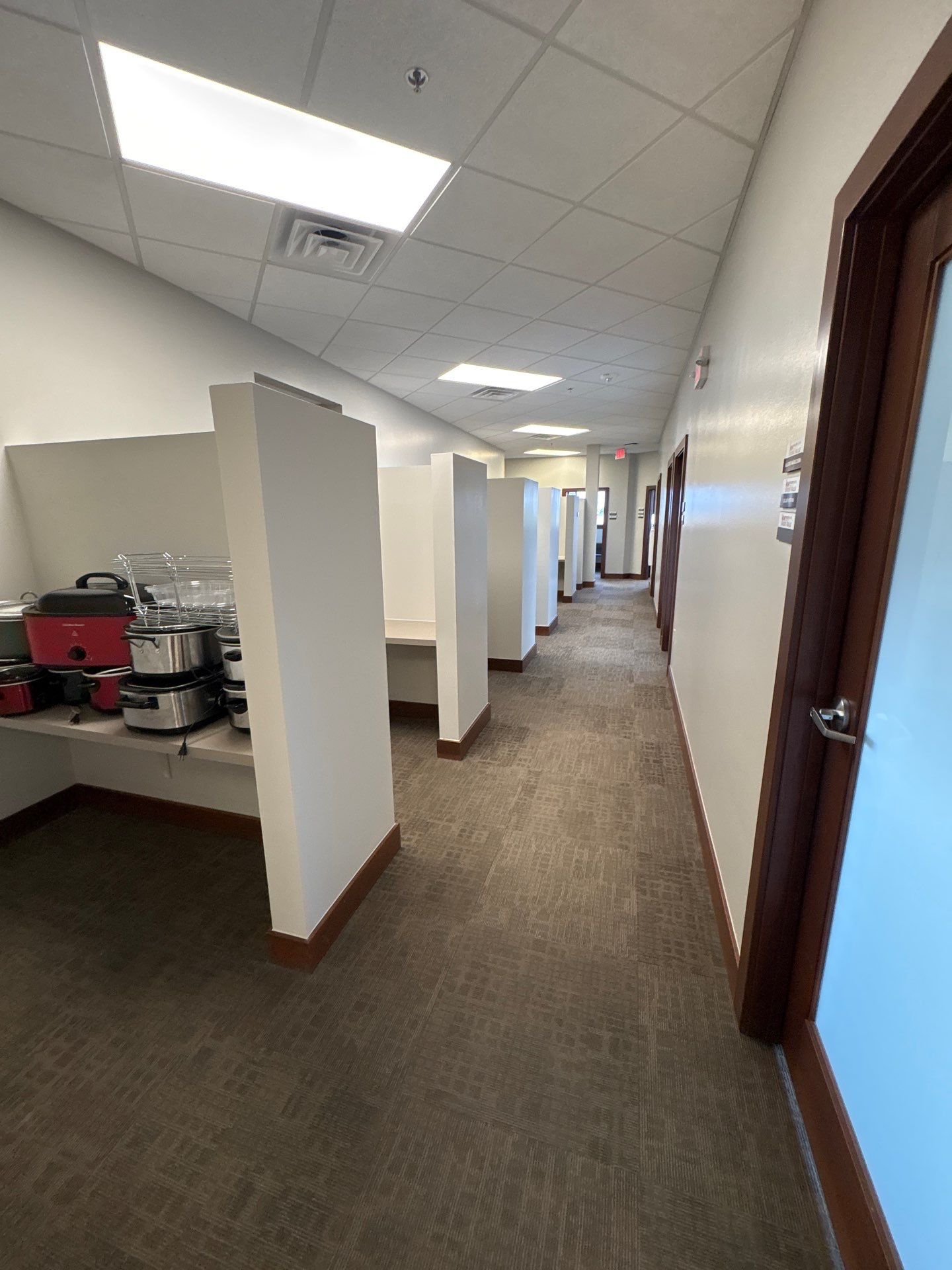 Commercial Office Interior Remodel and Modern Suite Refresh in Sioux Falls by Select Painting, Coatings & Garage Cabinets