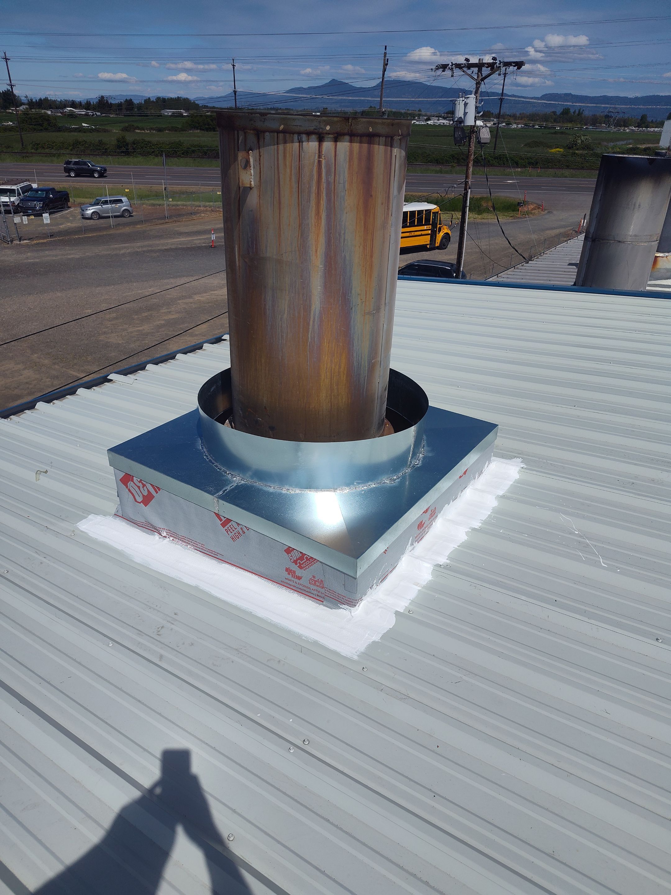 Installing New Curbs on a Metal Roof for new equipment by BEST Roofing & Waterproofing