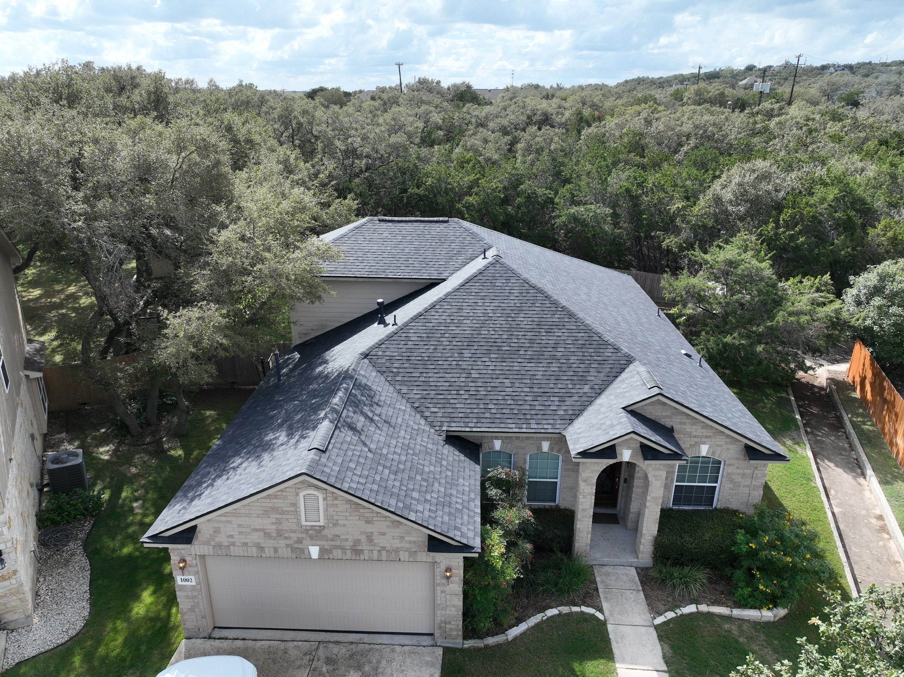 Residential Roof Replacement using Owens Corning Duration Shingles - Onyx Black by Premier Roofing and Contracting