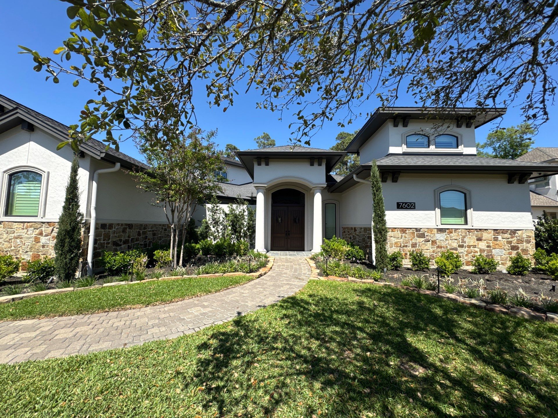 Complete Exterior Painting and Stucco Refinishing in Spring by Rolling Nations