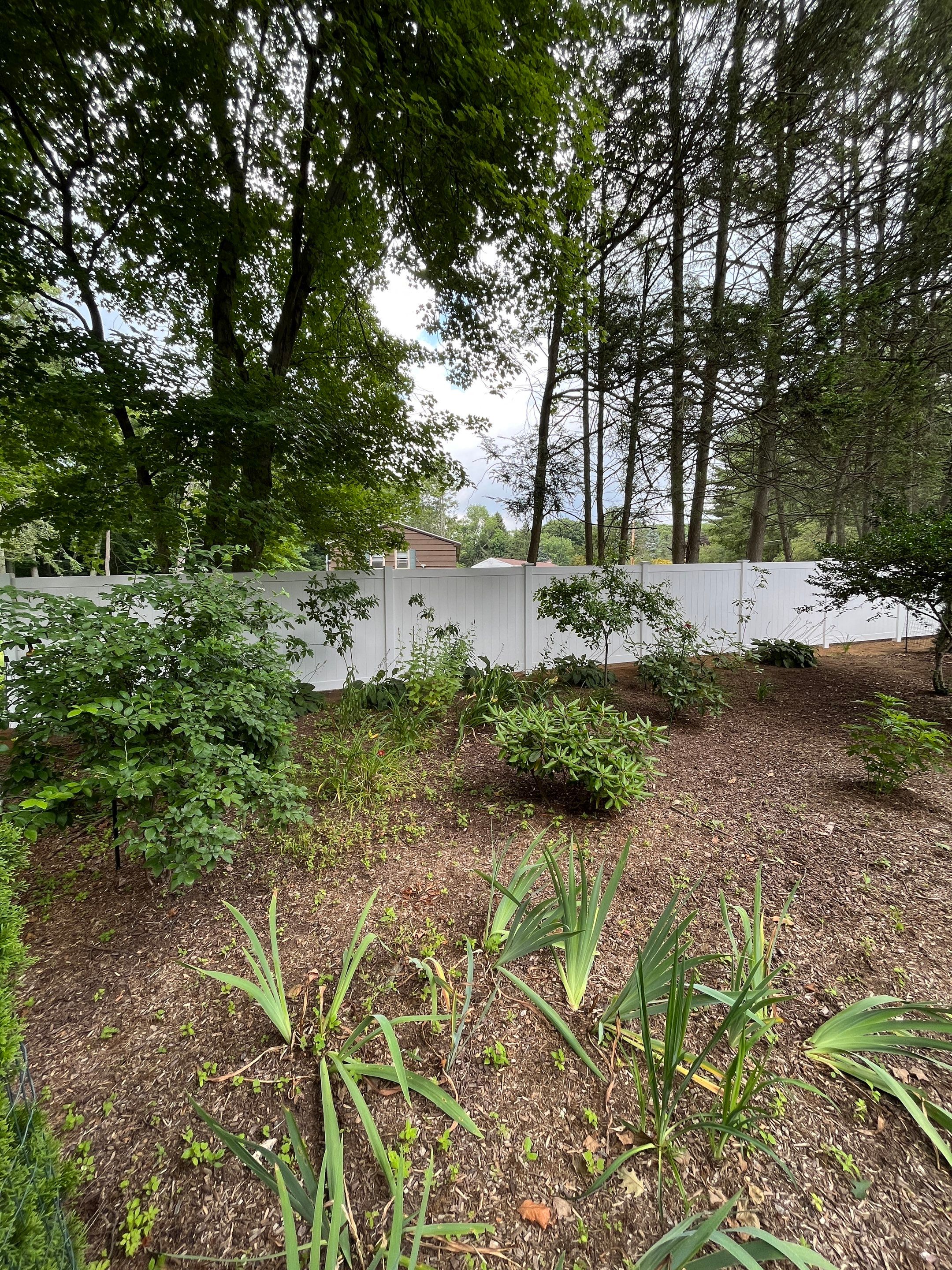 Replacement Vinyl privacy fence in White by DiGiorgi Roofing and Siding Inc