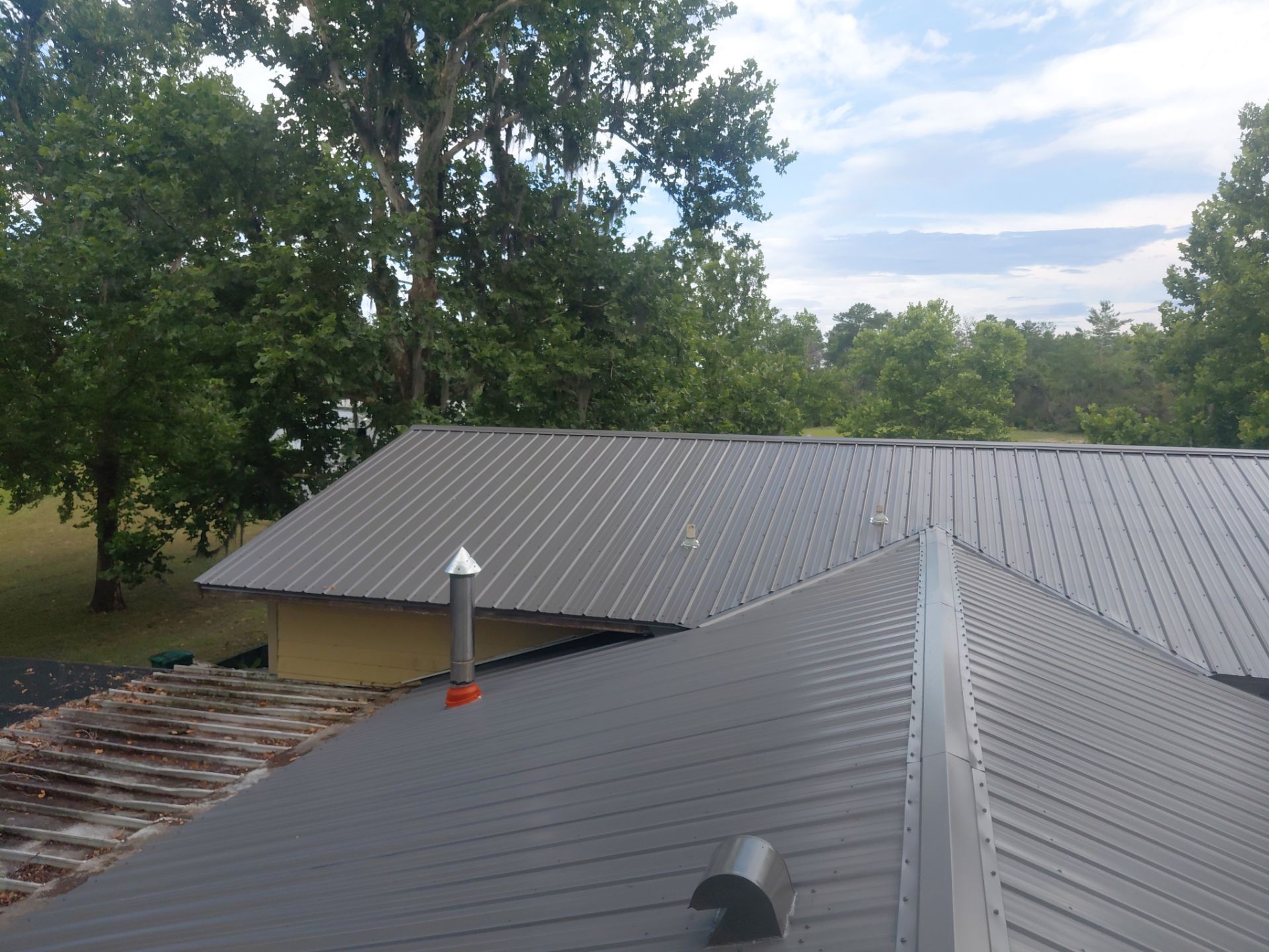 Metal Reroof Replacement Orange City FL by Pinnacle Roofing Group