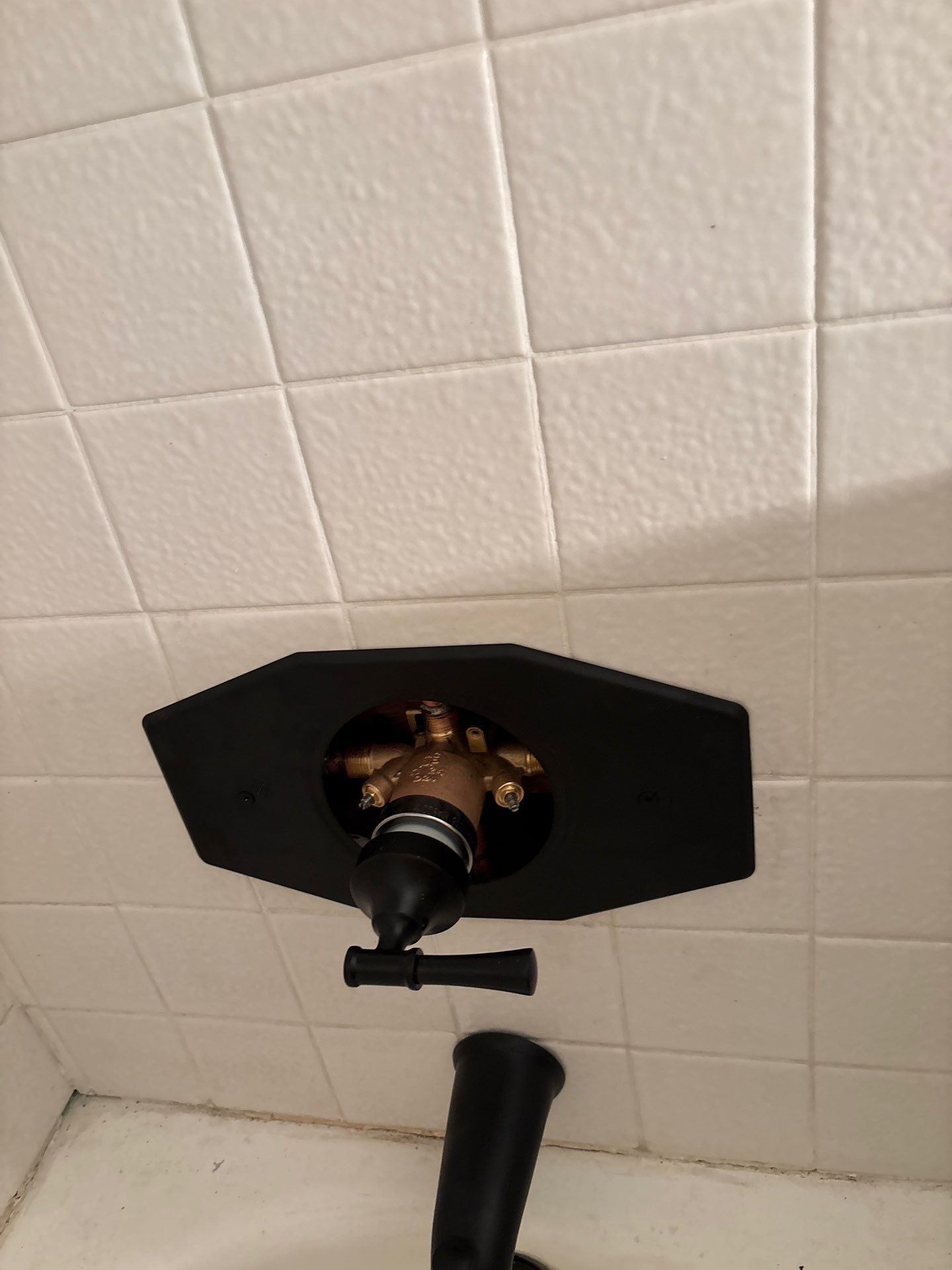 Installing Shower Fixtures  by Us Plumbing 