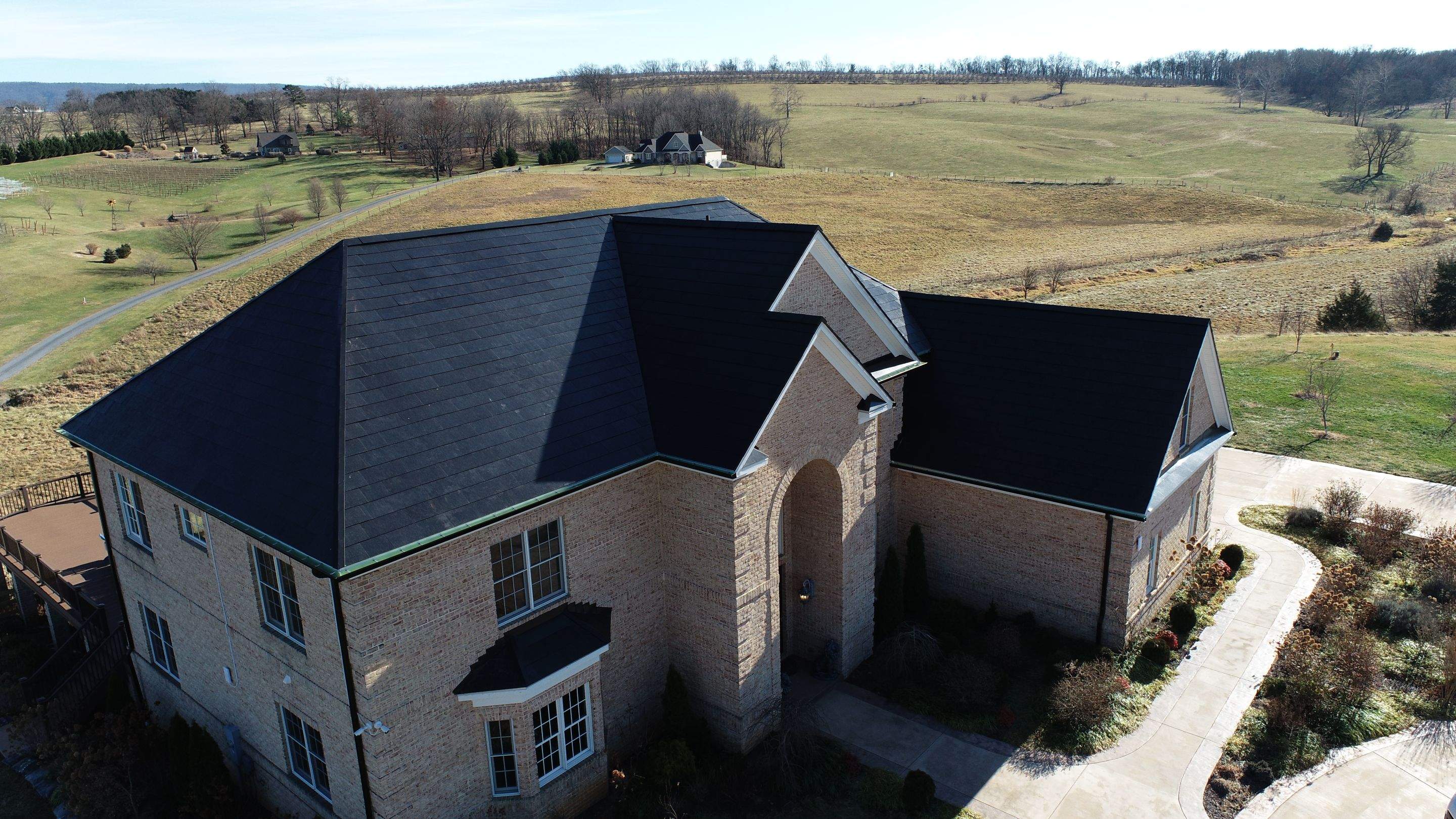 Tesla Solar Roof Replacement by American Home Contractors