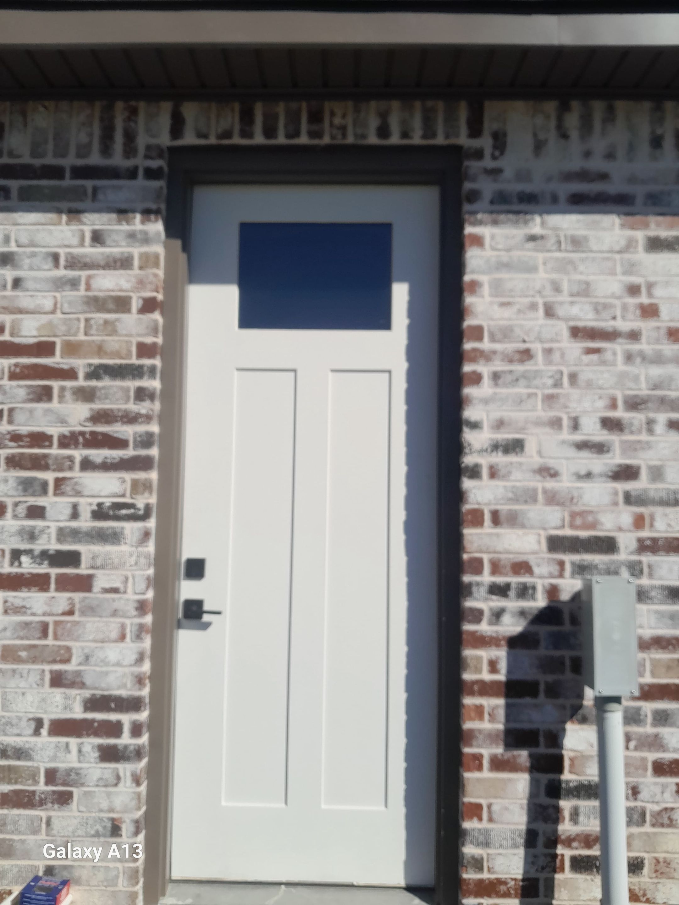 Fascia and door frames wrapped with PVC coil & soffit installation by In & Out Construction & Remodeling, LLC