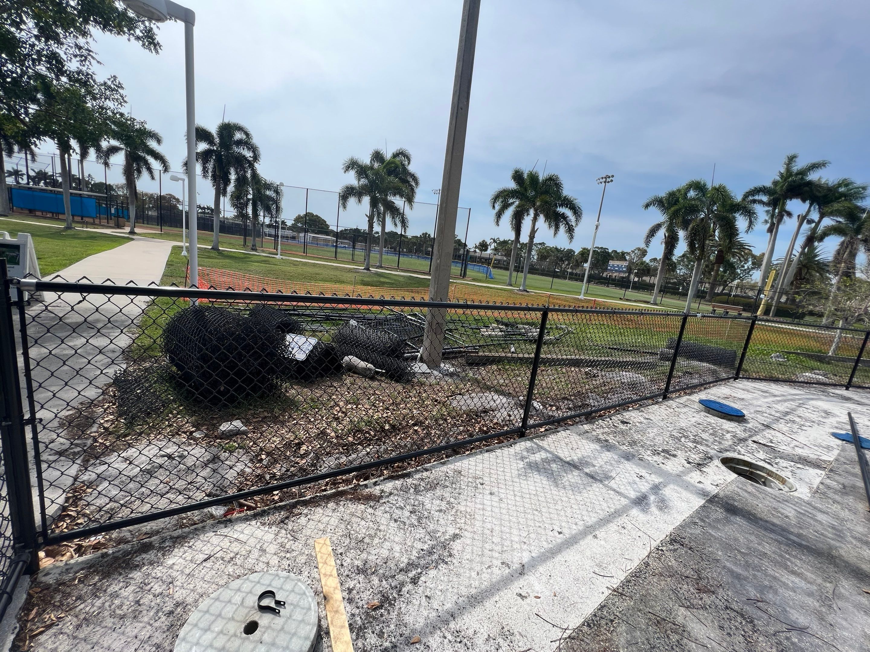 Vinyl Coated Chain-link fence for the City of Naples around Fleischmann Park Playground.  by Asap fence and gates, LLC