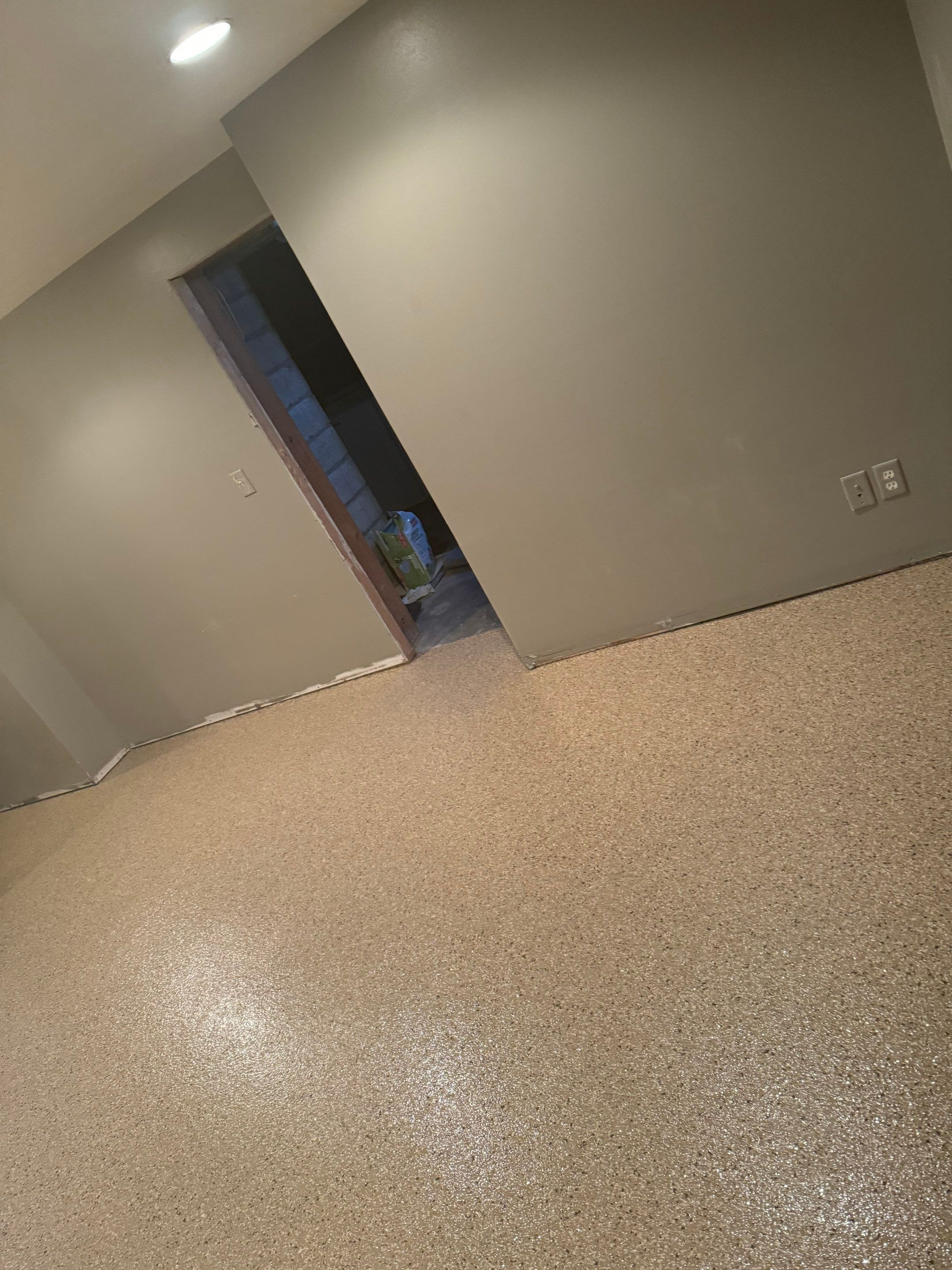 Custom Multi-Fleck Epoxy Floor Coating for Residential Basement by Select Painting, Coatings & Garage Cabinets