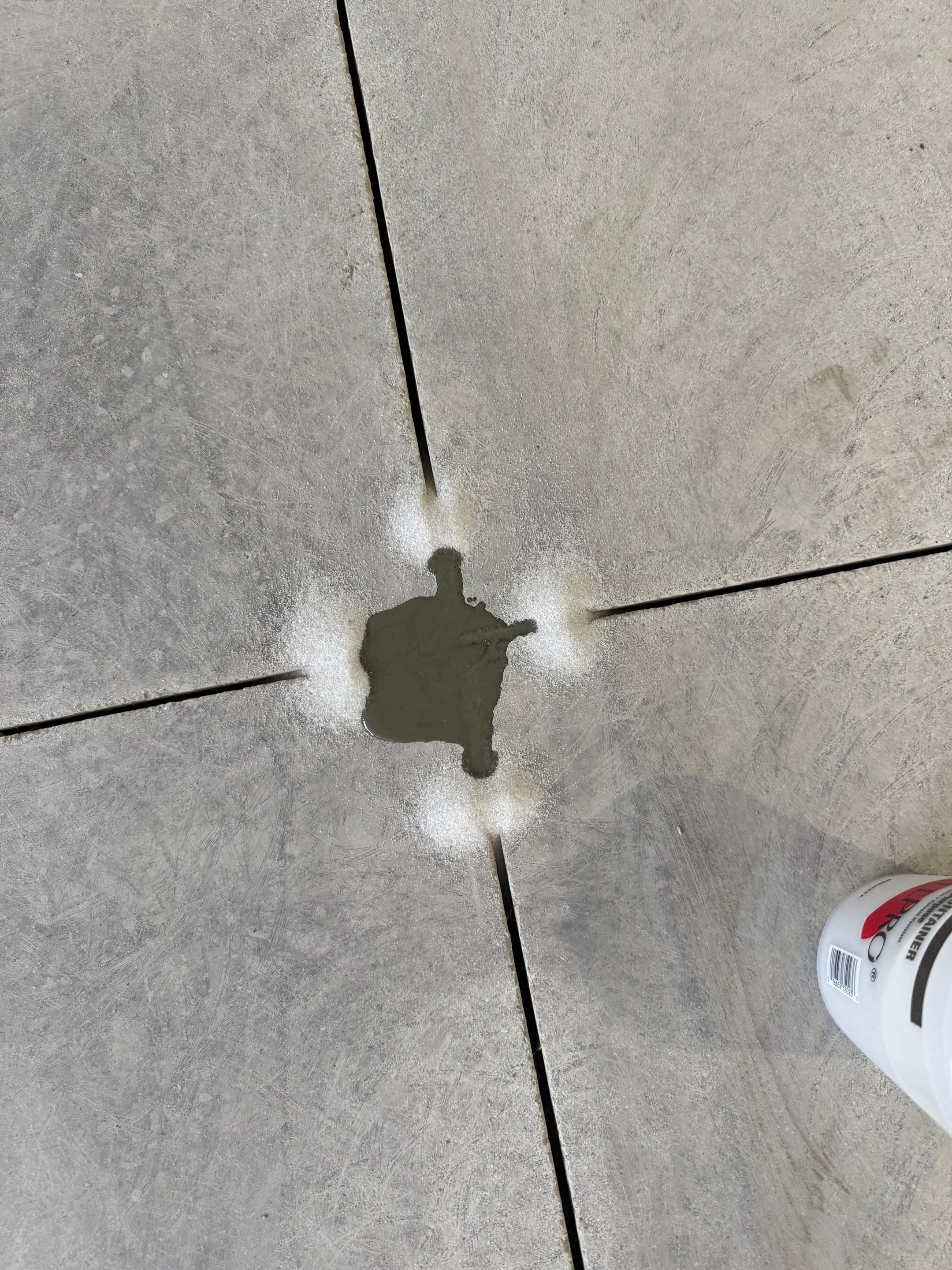 High-Gloss Epoxy Flake Garage Floor Coating in Brandon by Select Painting, Coatings & Garage Cabinets