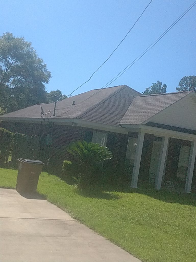 Residential Roofing Installation using Roof Replacement by American Roofing & Construction LLC