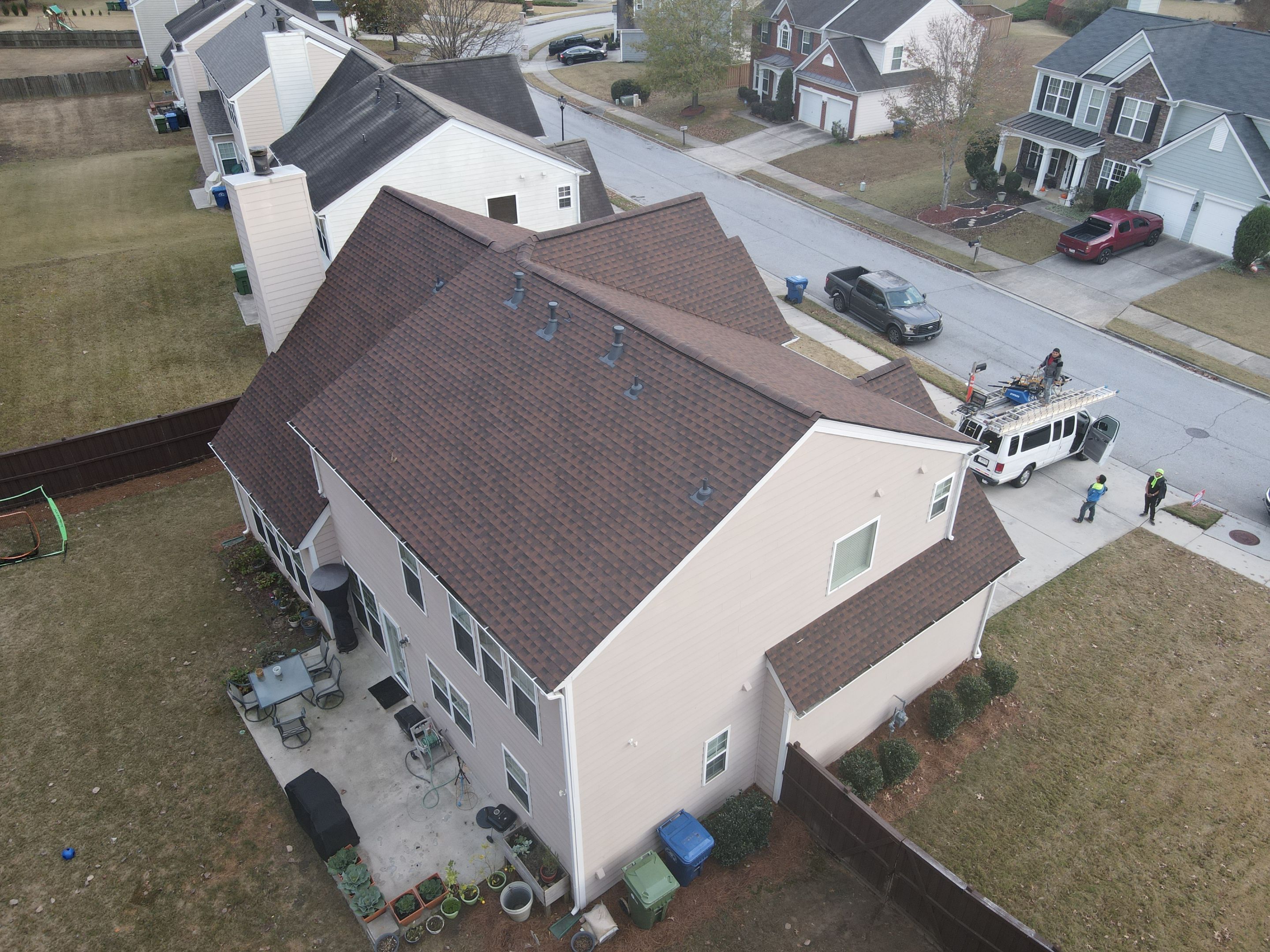 Residential Roofing Installation using Timberline HDZ Hickory  by Inspector Roofing and Restoration
