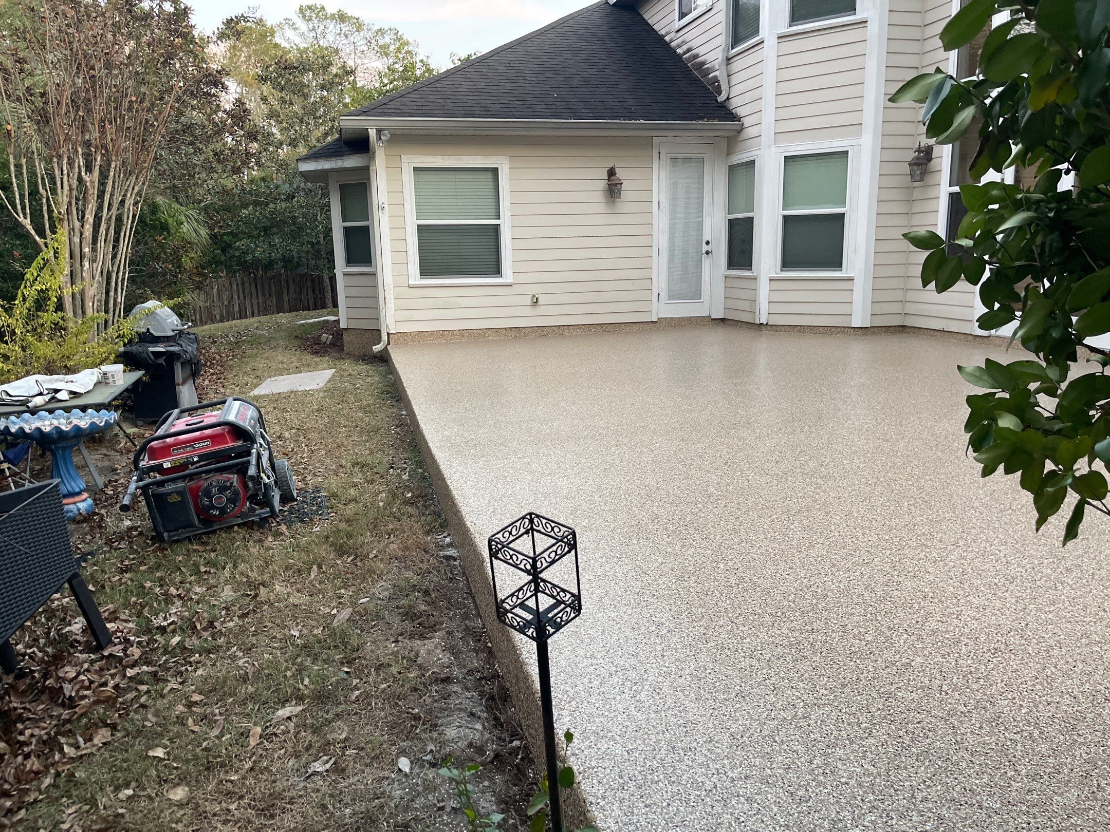 Patio  in Gainesville, FL in Sandstone by Cross Creek Concrete Coatings