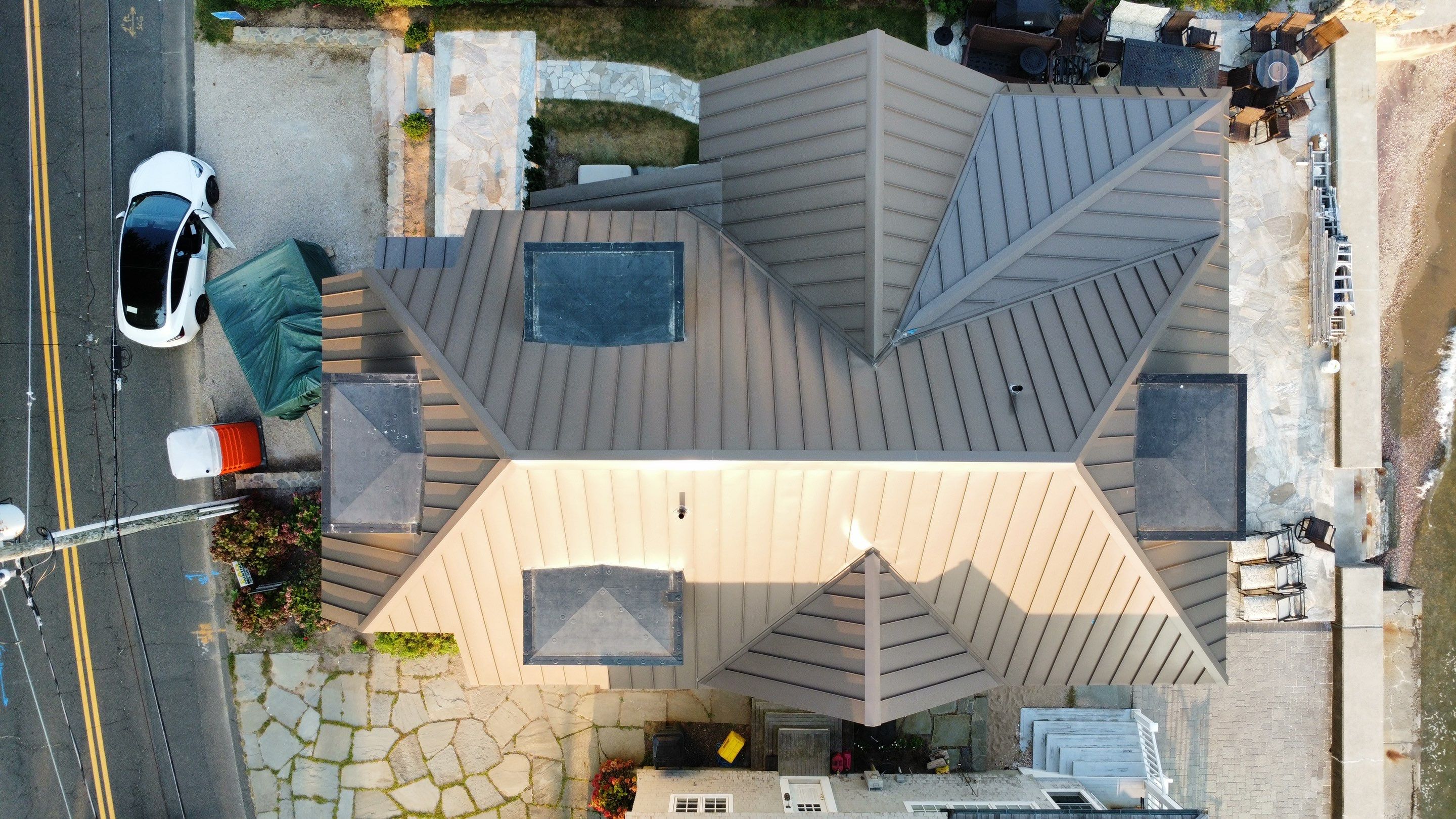 Standing Seam Aluminum Roof Installation by Lecla Home Improvements and Roofing INC