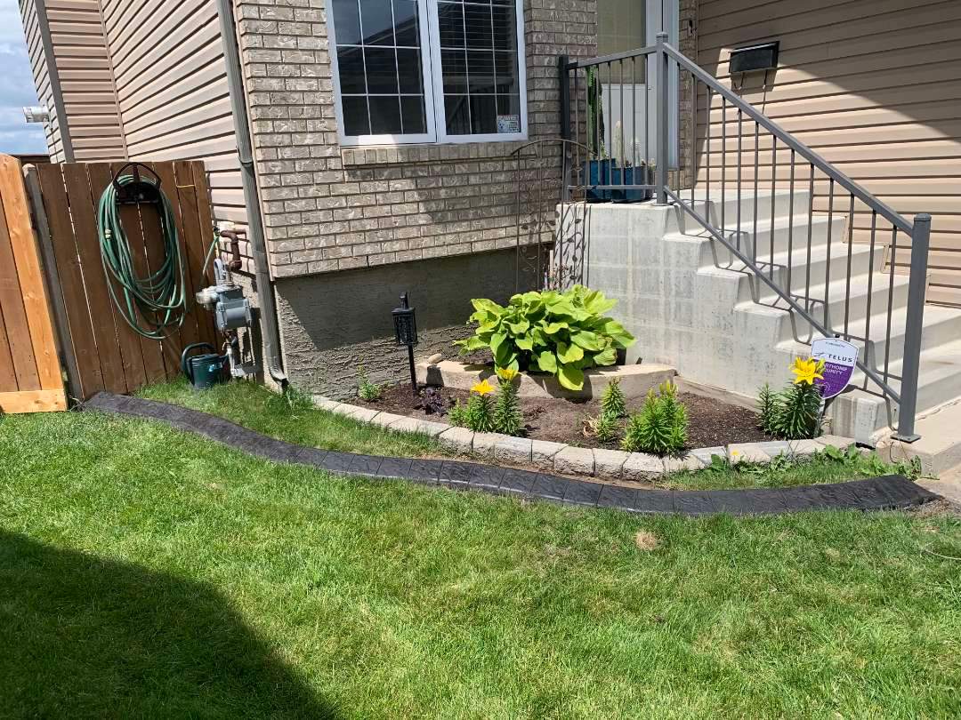 Stamped Concrete Border and Landscape Edging Installation in Medicine Hat by Pump it Up Concrete Jacking