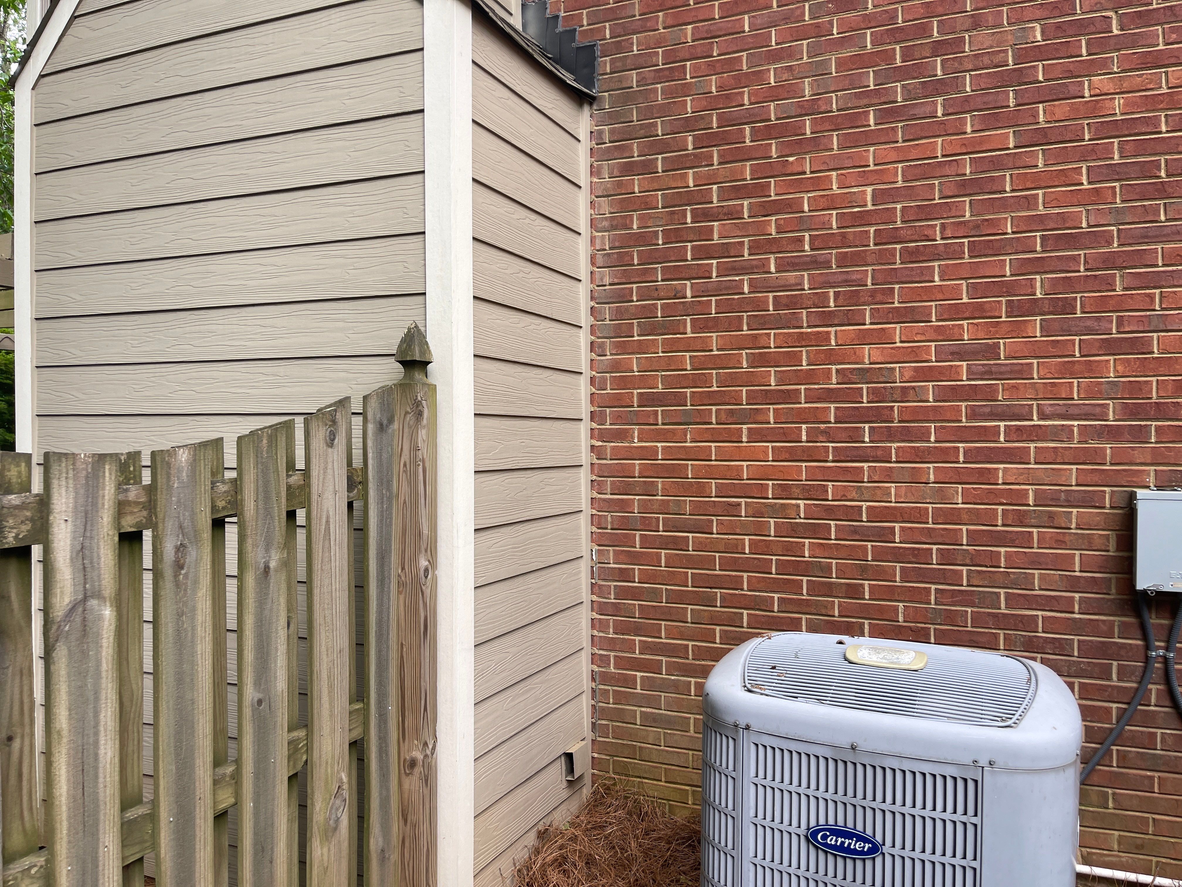 Marietta, GA Rotten Wood Replacement, Chimney Corner Board Installation, Gutter Replacement, and Exterior Painting by Nelson Exteriors