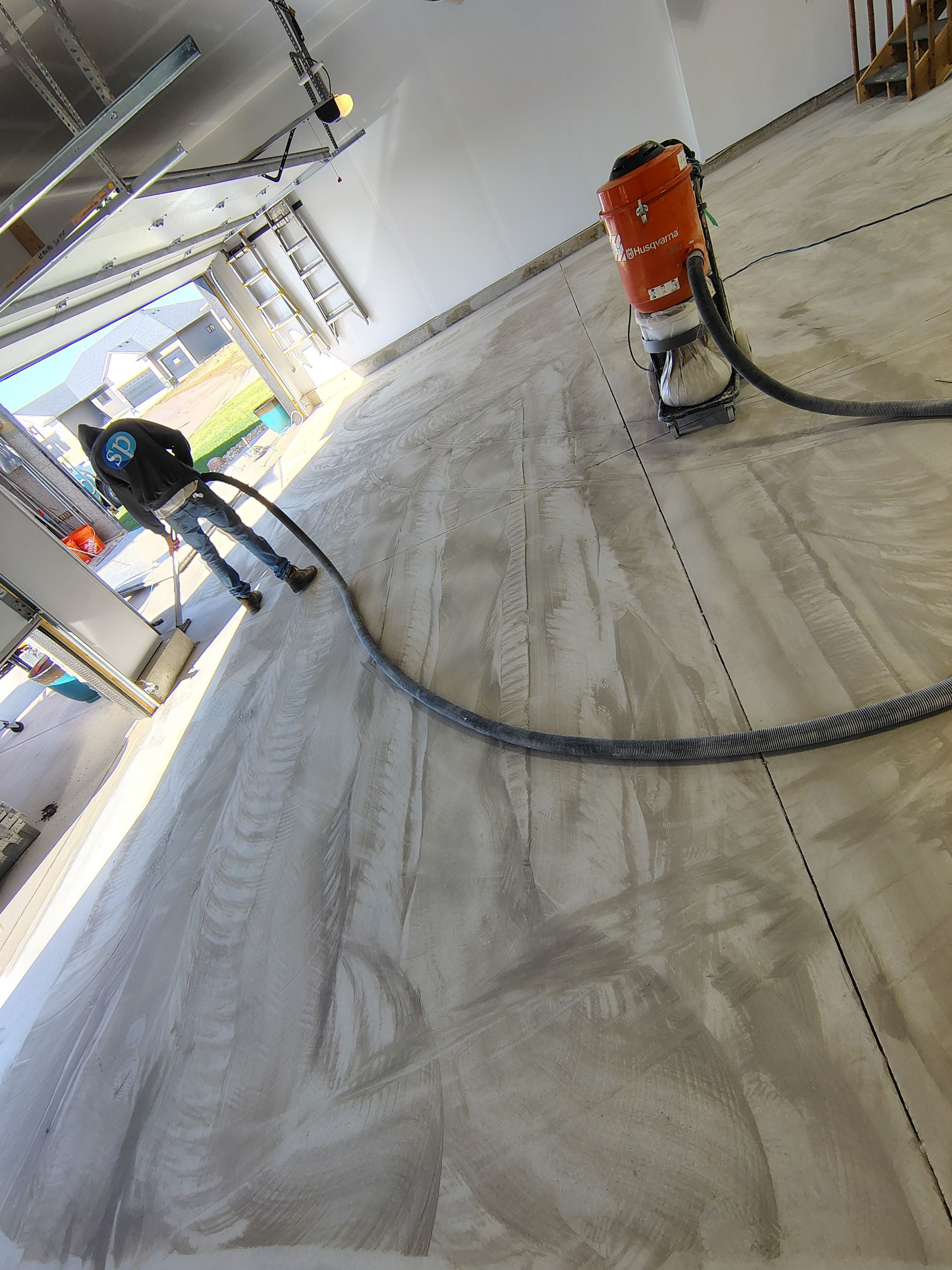 Decorative Flake Garage Floor Coating Installation in Tea, South Dakota by Select Painting, Coatings & Garage Cabinets