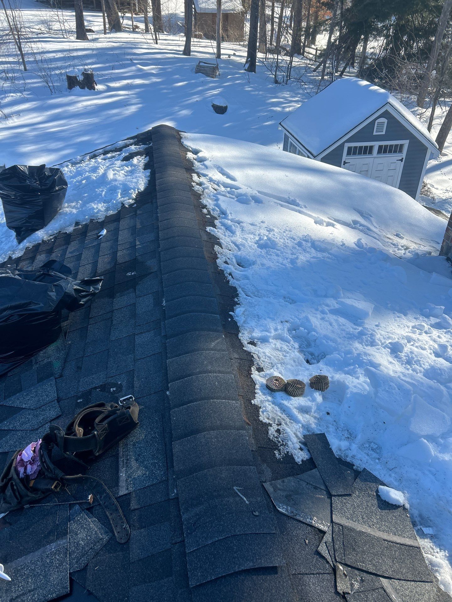 Ridge Cap Replacement & Black Metal Valley Installation in Chelmsford, MA by Mighty Dog Roofing of Greater Middlesex County