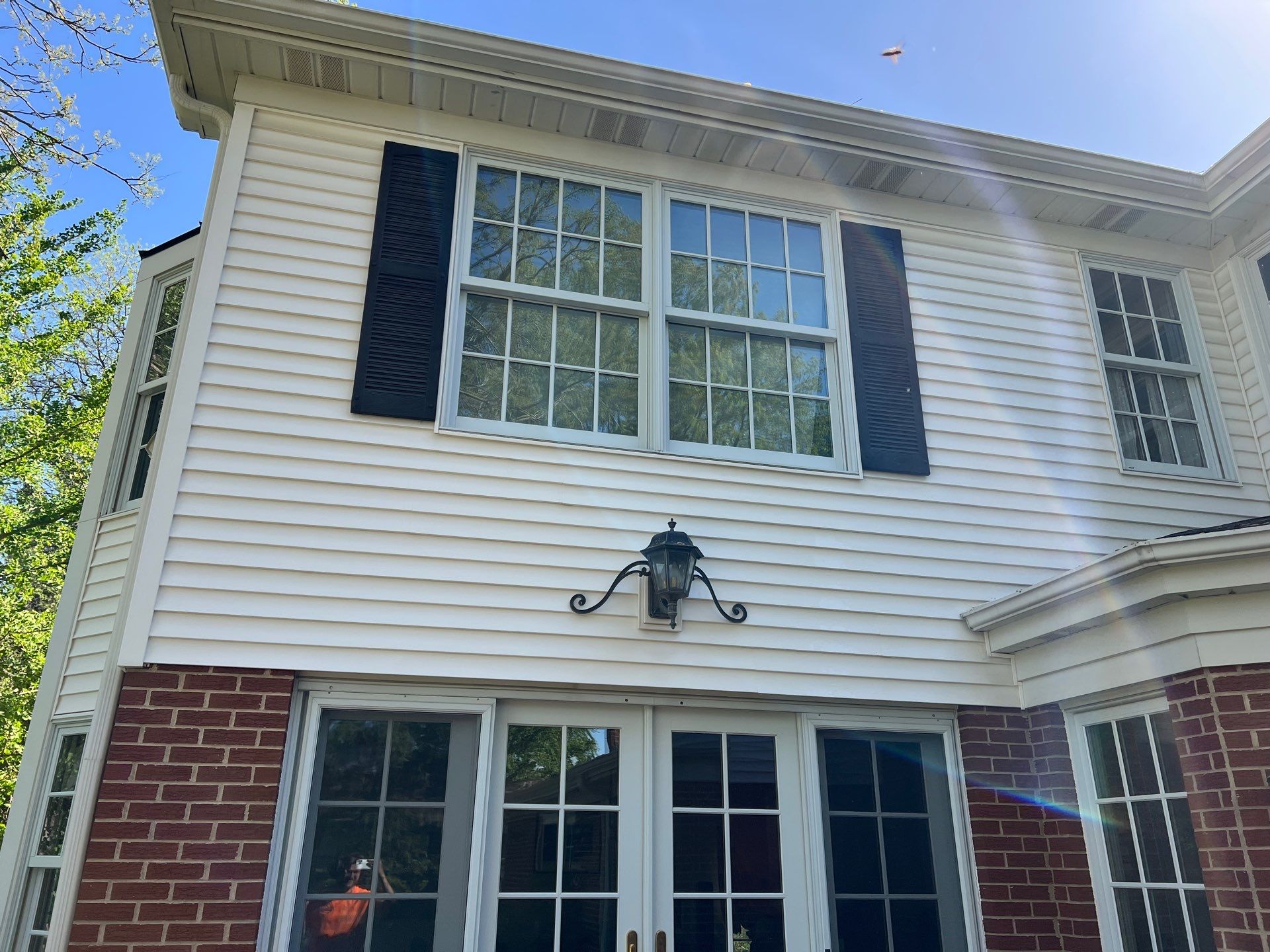 Housewashing  using Algaecide, soft wash soap by Northern Power Washing LLC.