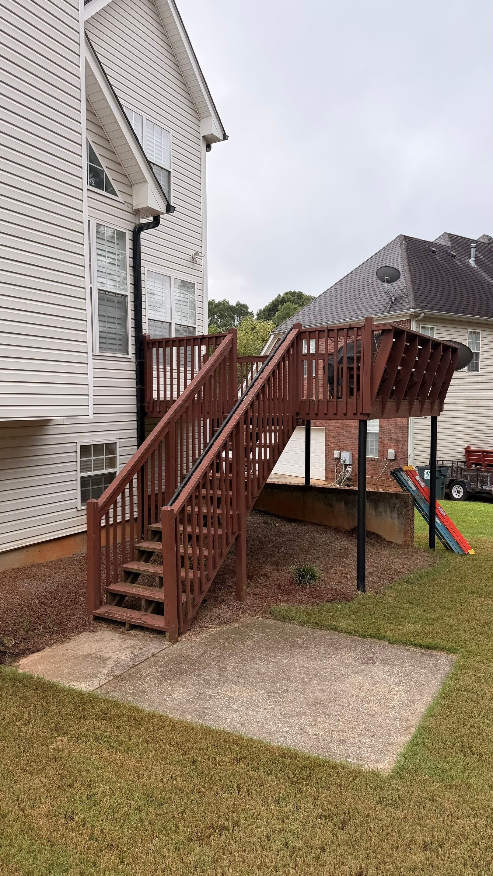Elevated Pressure-Treated Deck and Staircase Rebuild in Douglasville by Swift Home Renovations