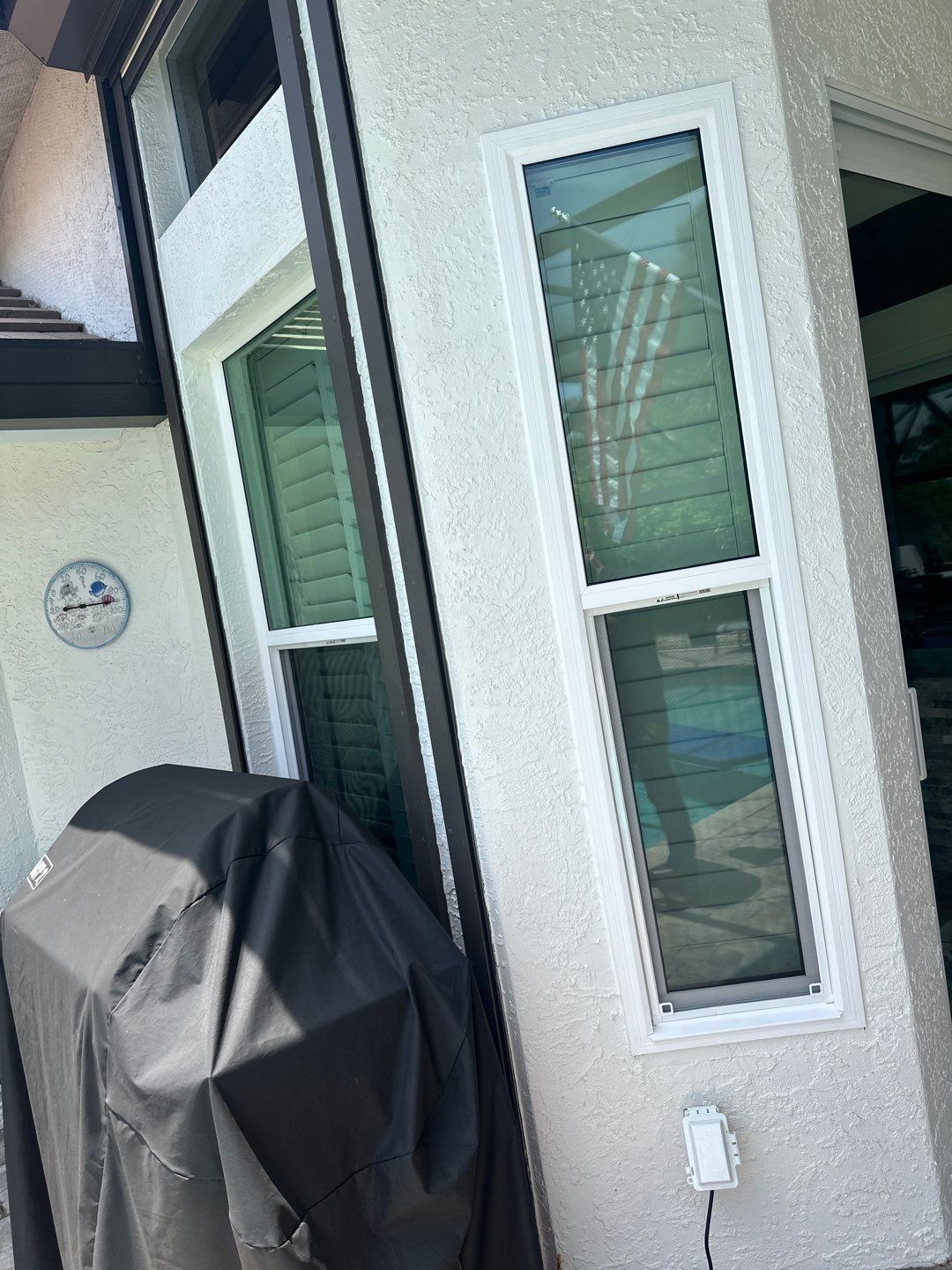 Window Installation using PGT Aluminum for the doors and PGT Vinyl for the Windows  by Windows For Life 