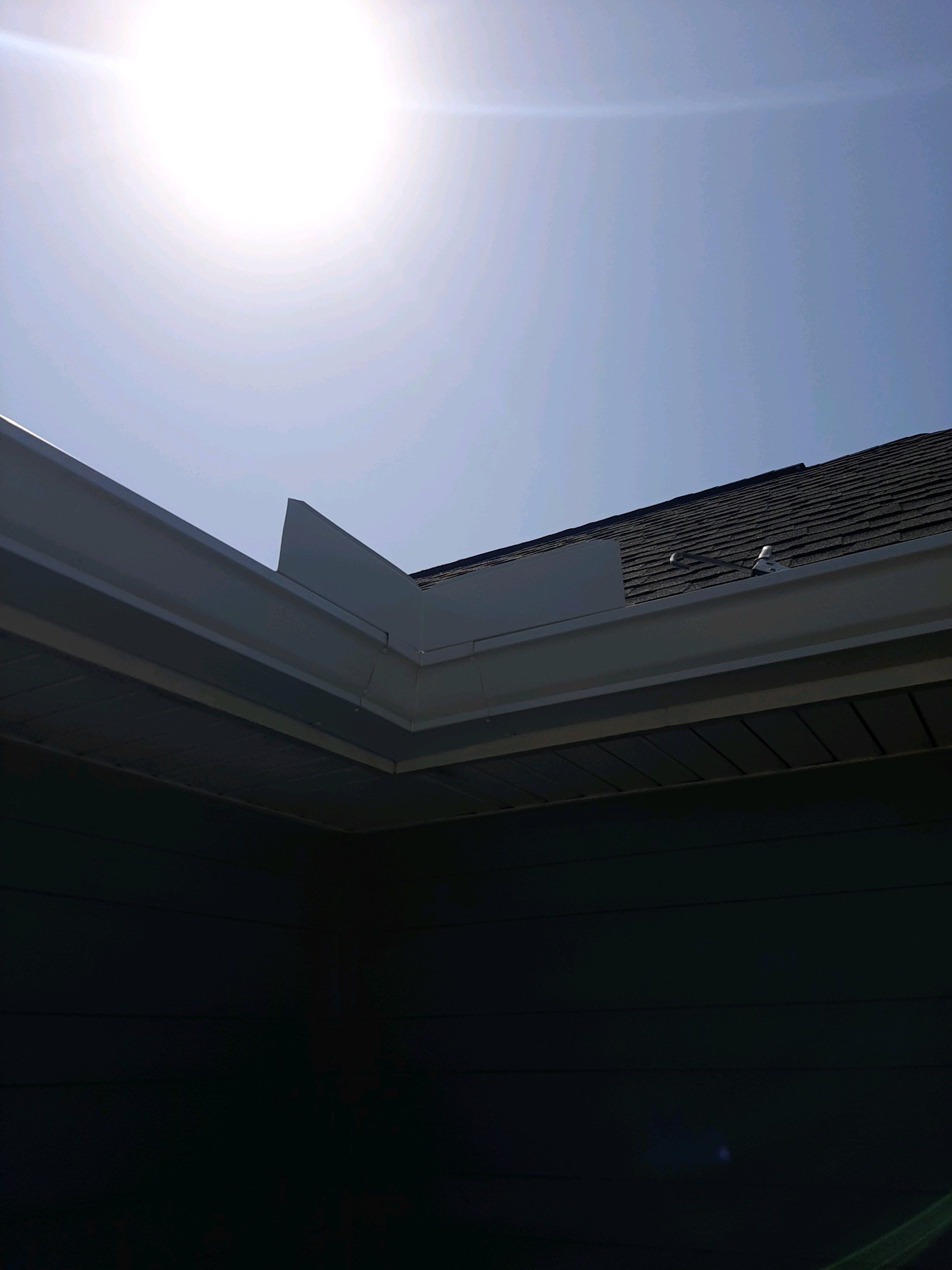 Gutter Installation Using White K-Style 6 Inch Seamless Gutters by Gutter Professors