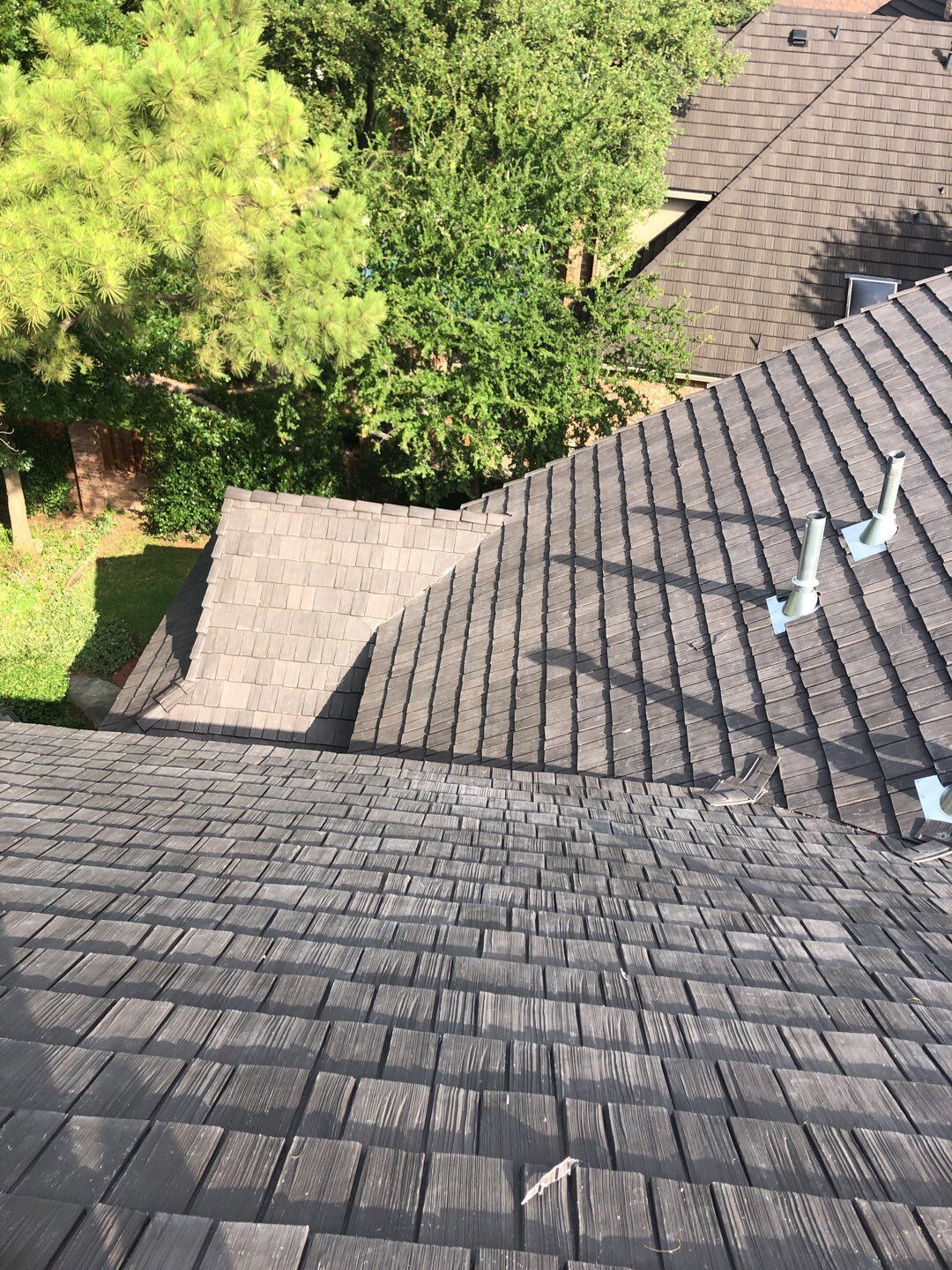 Designer Residential Roof with Zip System by Springtree Restoration