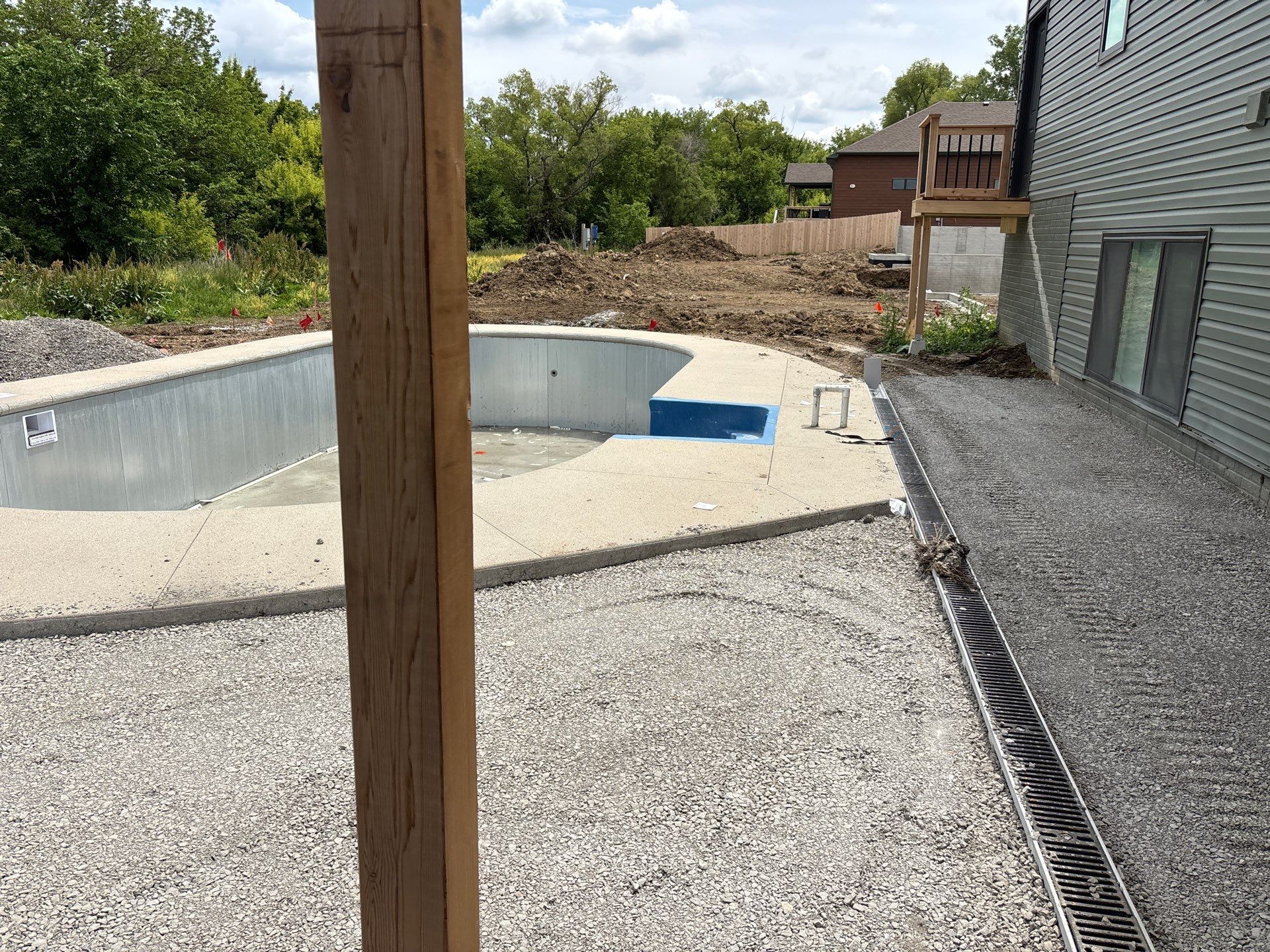 New Residential Construction - Paver, Putting Green, Pool by New Horizon Landscapes