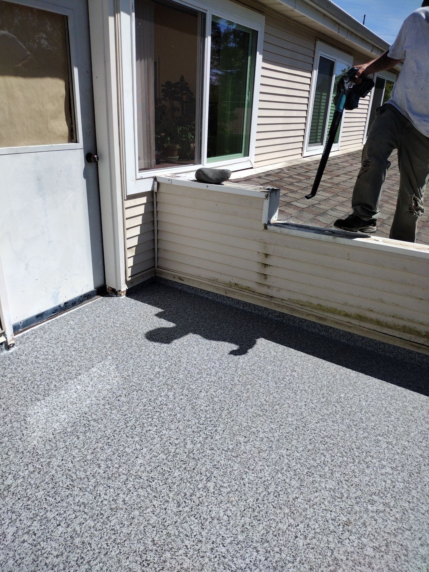 Dec-Tec Walkable Membrane using Dec-Tec (Color: Granite) by Orezona Building & Roofing Company, Inc.
