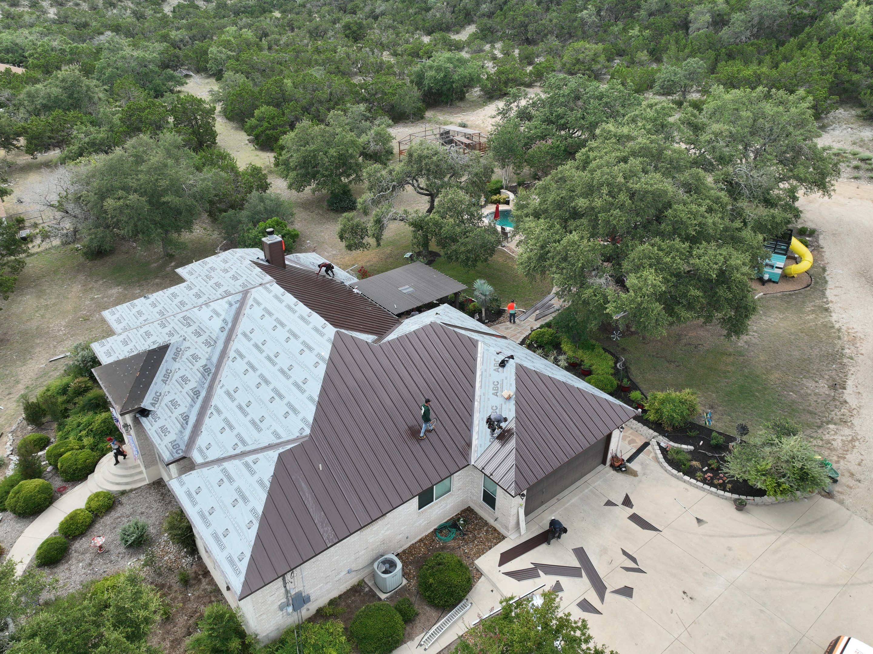 Residential Metal Roof Installation using McElroy Metal by Premier Roofing and Contracting