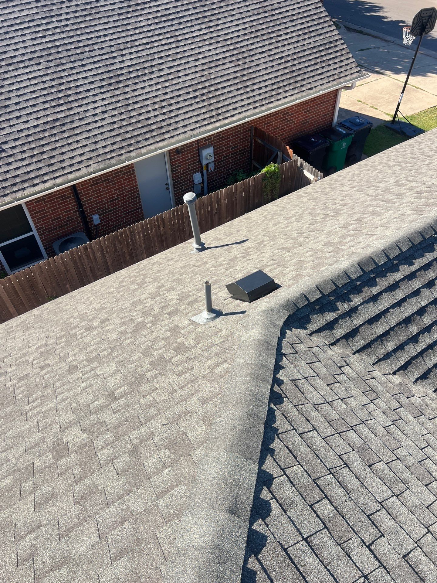 Roof Replacement and Gutter Installment in Edmond, OK by McCann's Roofing and Construction