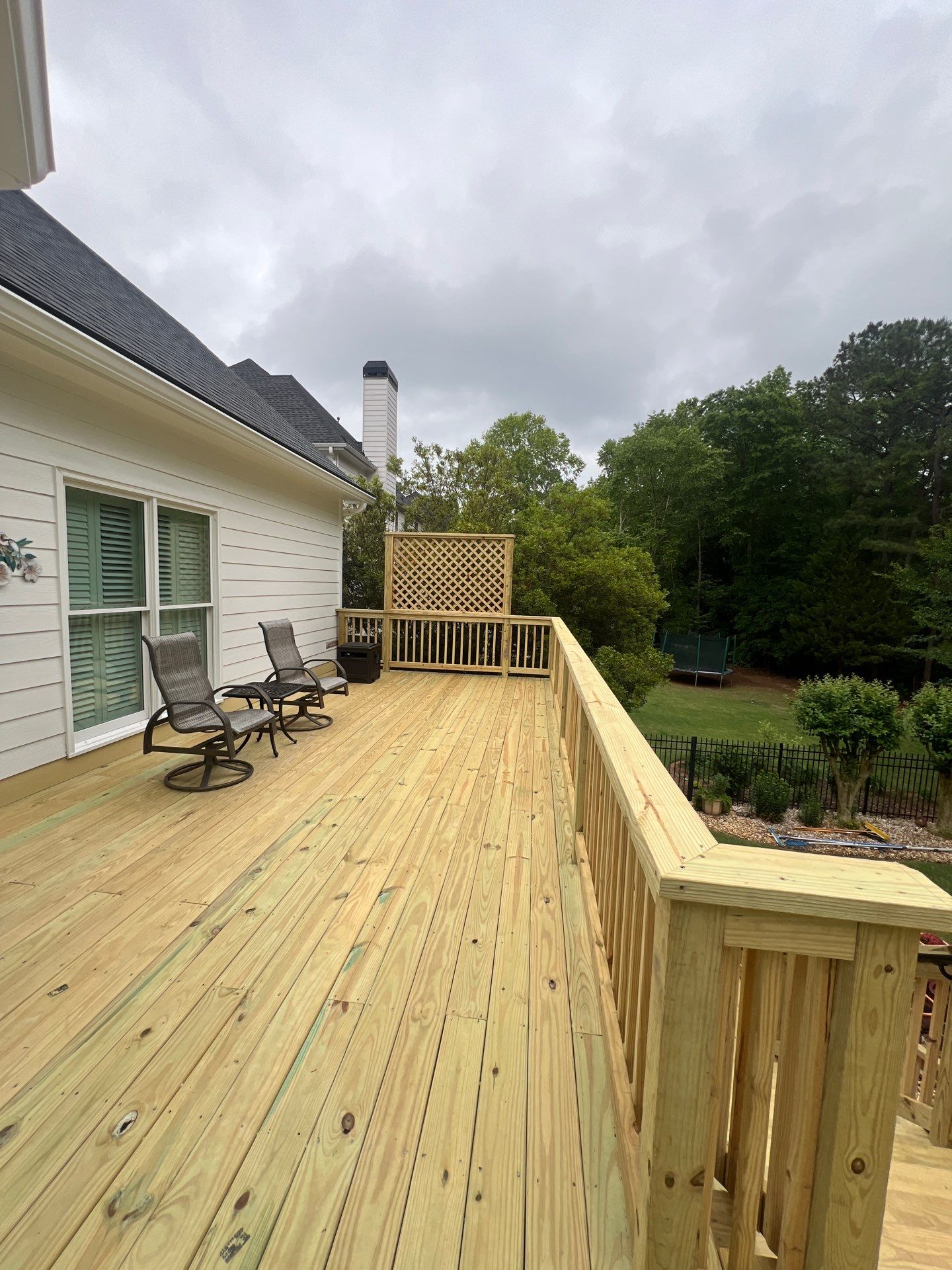 Multi-Level Pressure-Treated Wood Deck and Screened Porch in Acworth by Swift Home Renovations