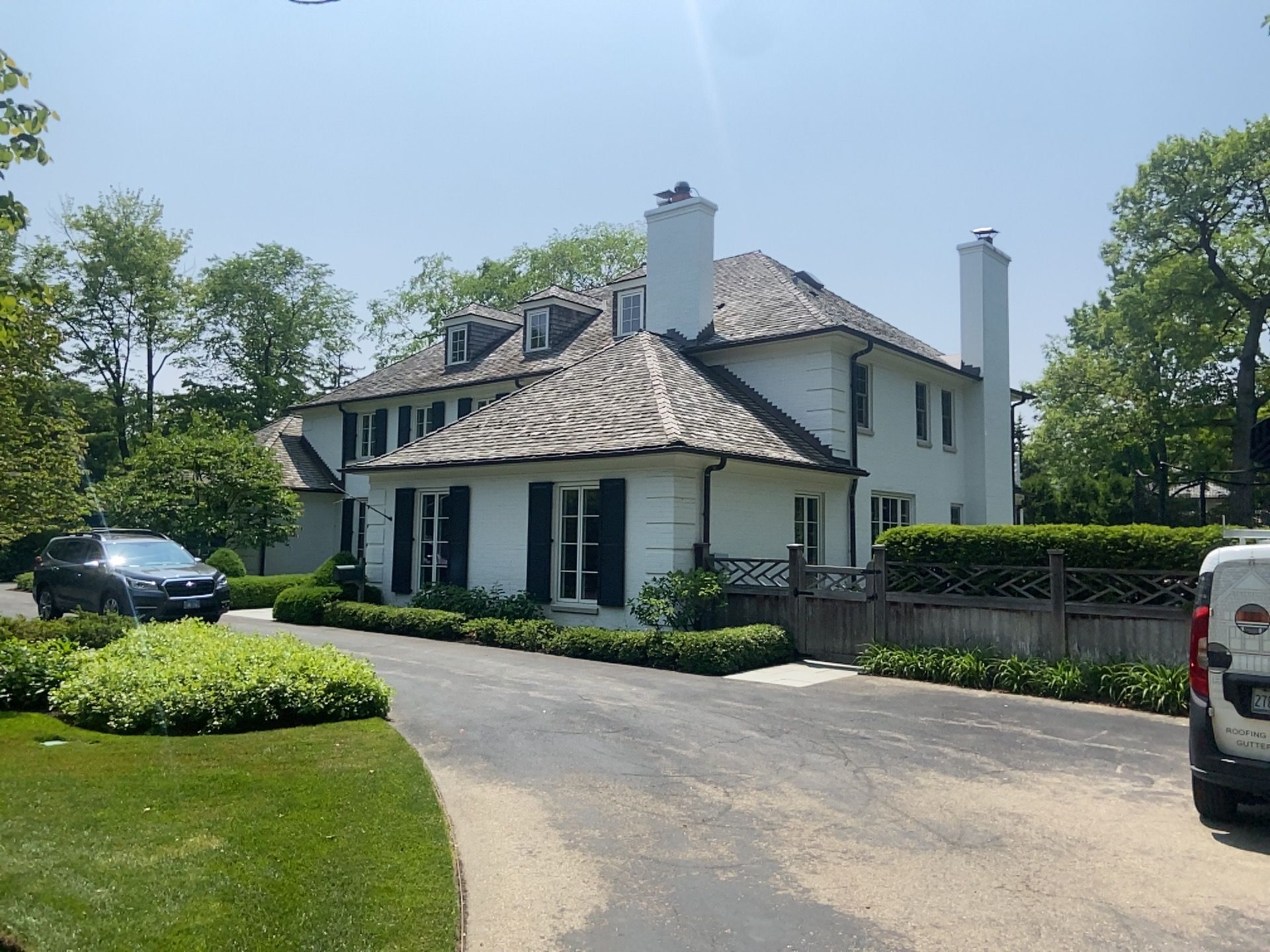 Cedar Shake Roof Replacement with Half Round Copper Gutter Installation  by Custom Installations, Inc.